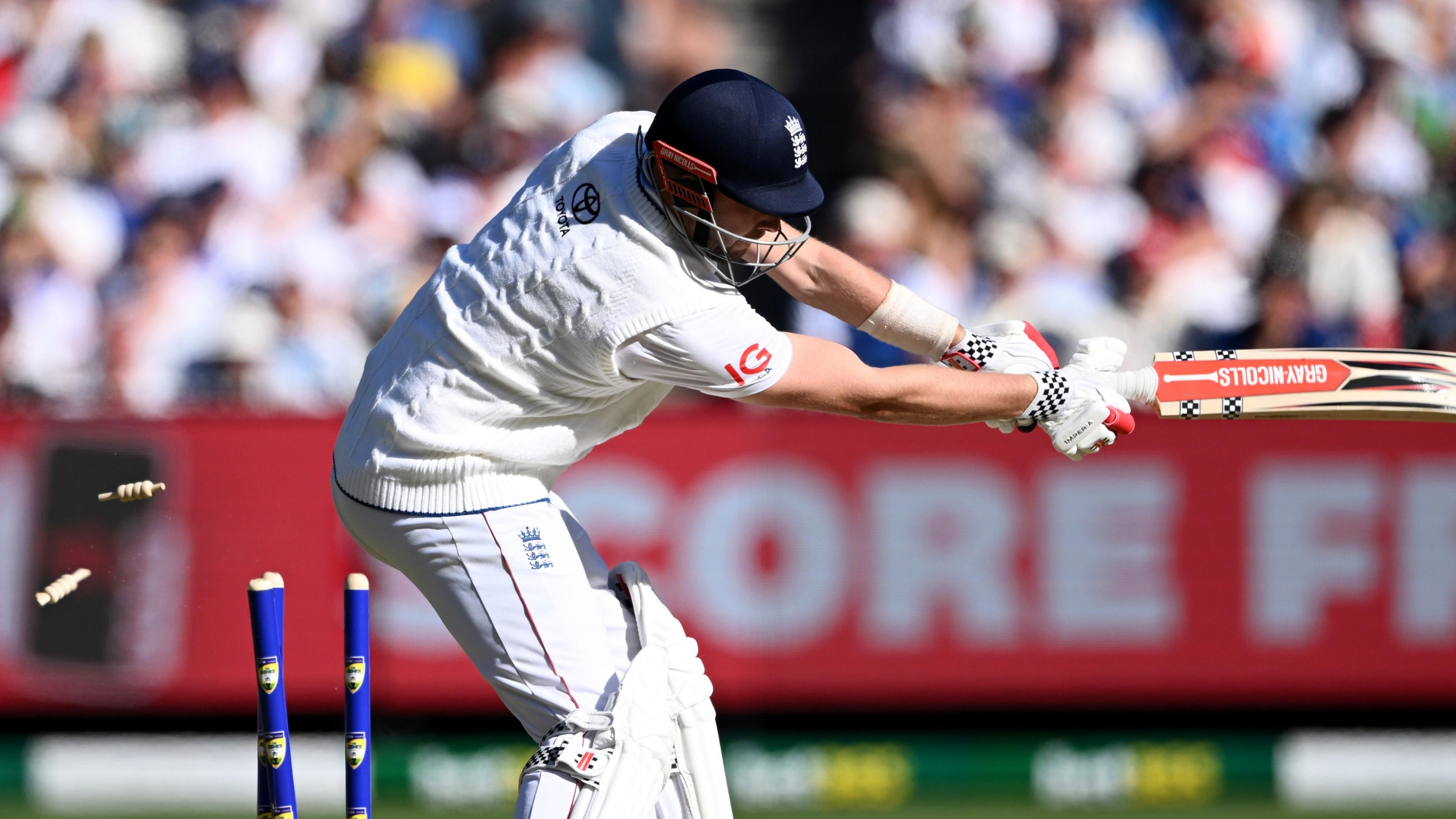 Gus Atkinson is dismissed after being bowled
