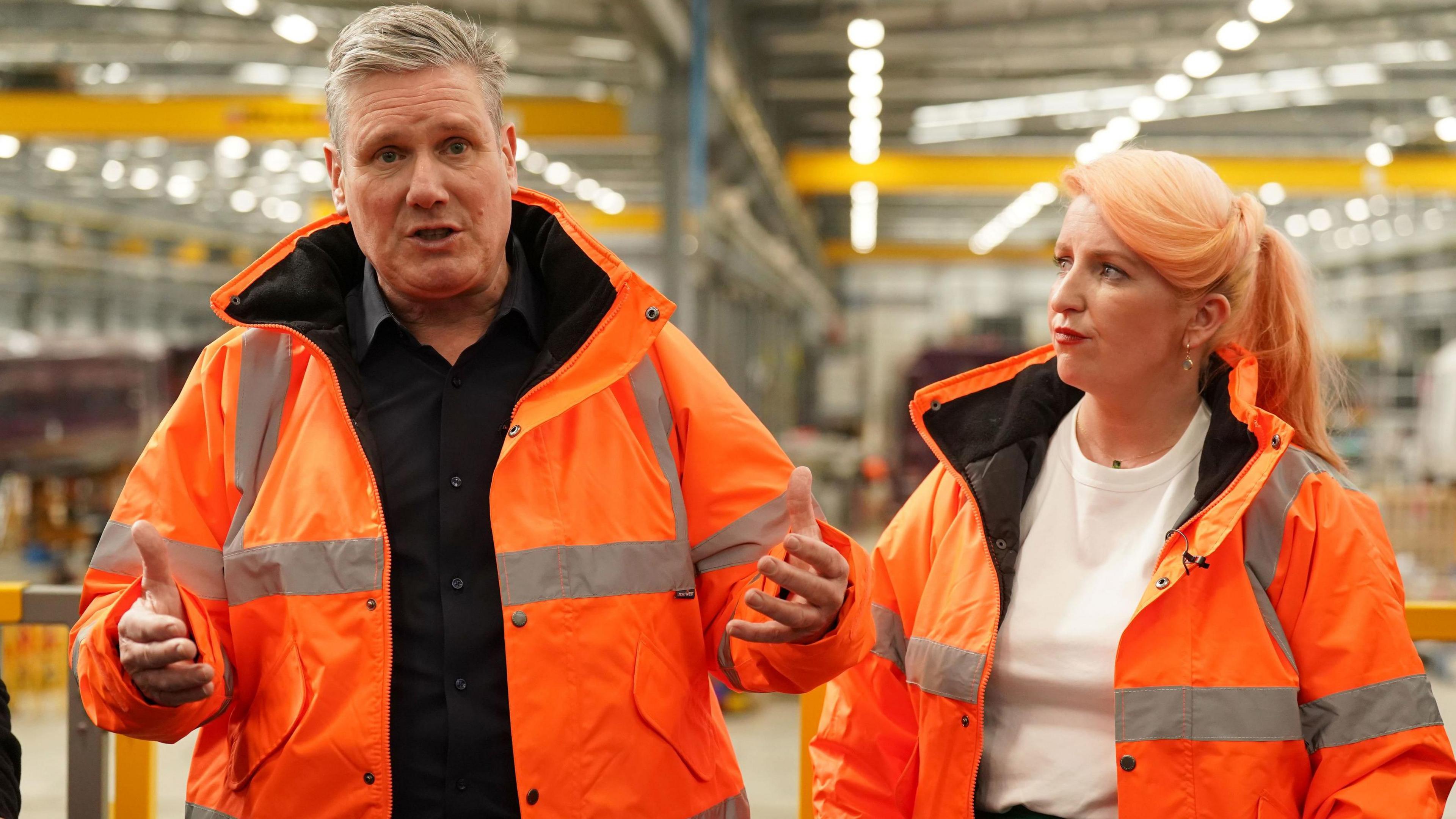 Keir Starmer and Louise Haigh wearing high vis jackets 