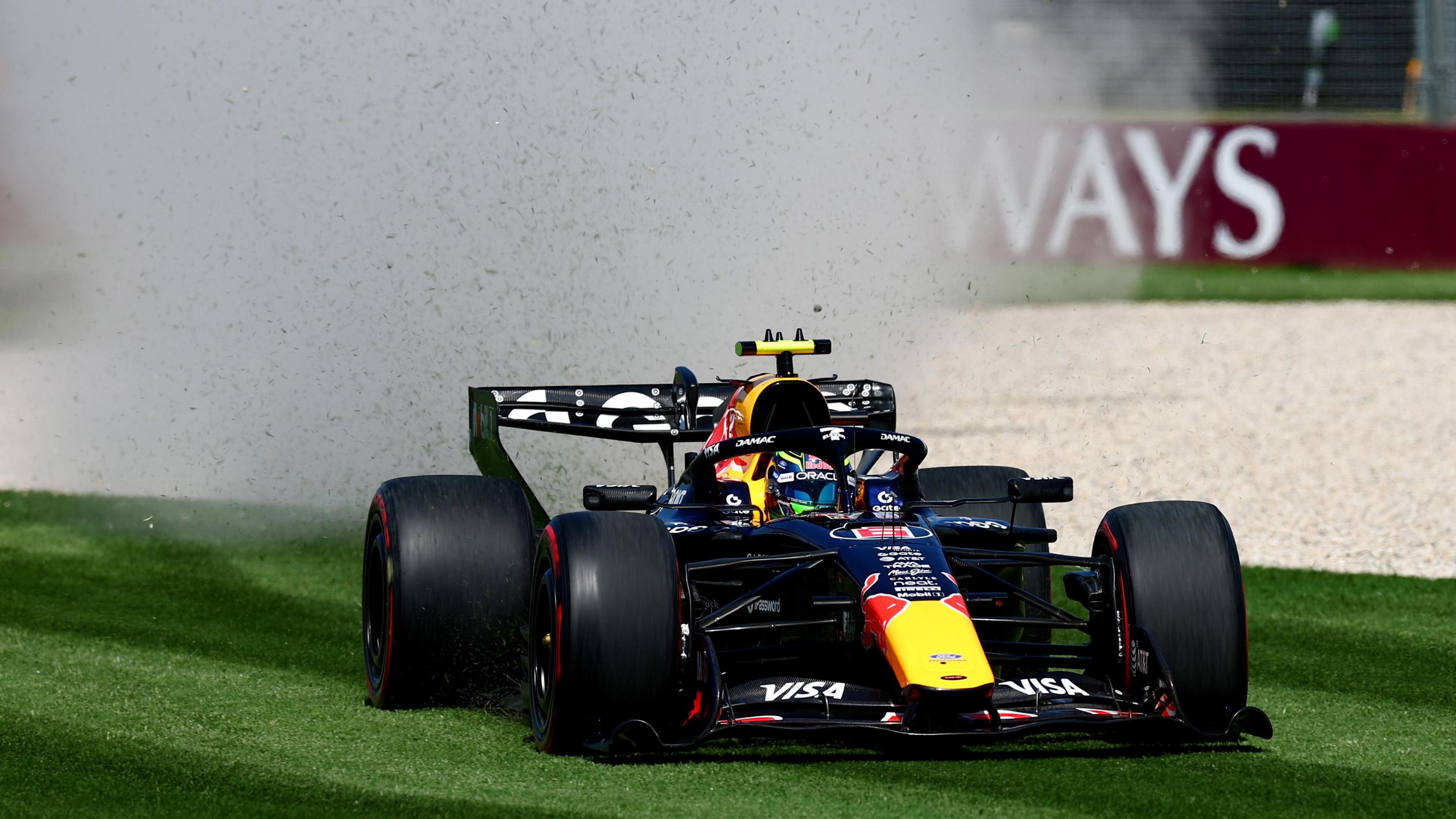Red Bull's Isack Hadjar goes off track and on to the grass during Australian Grand Prix first practice