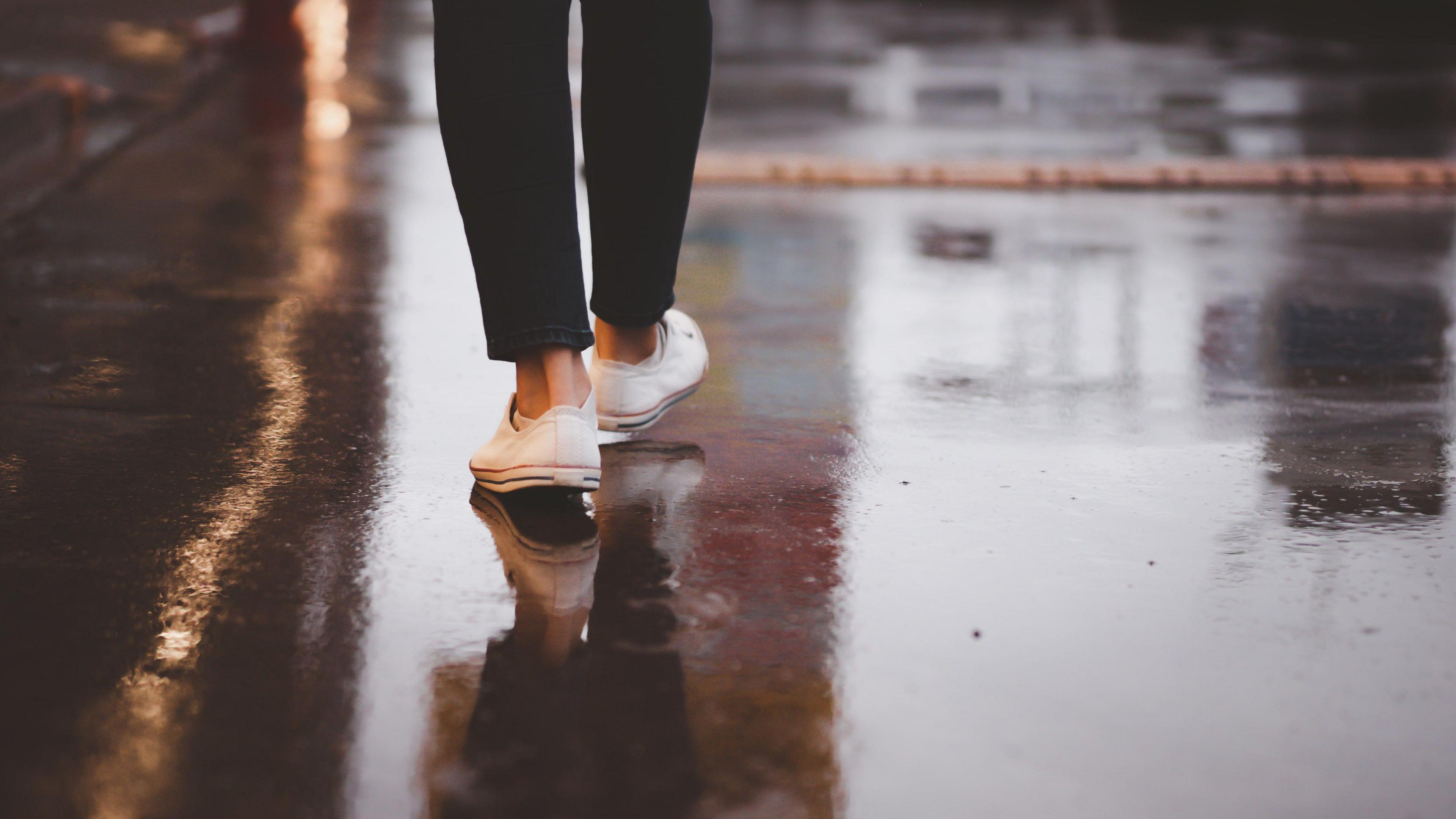 A woman walking down the street