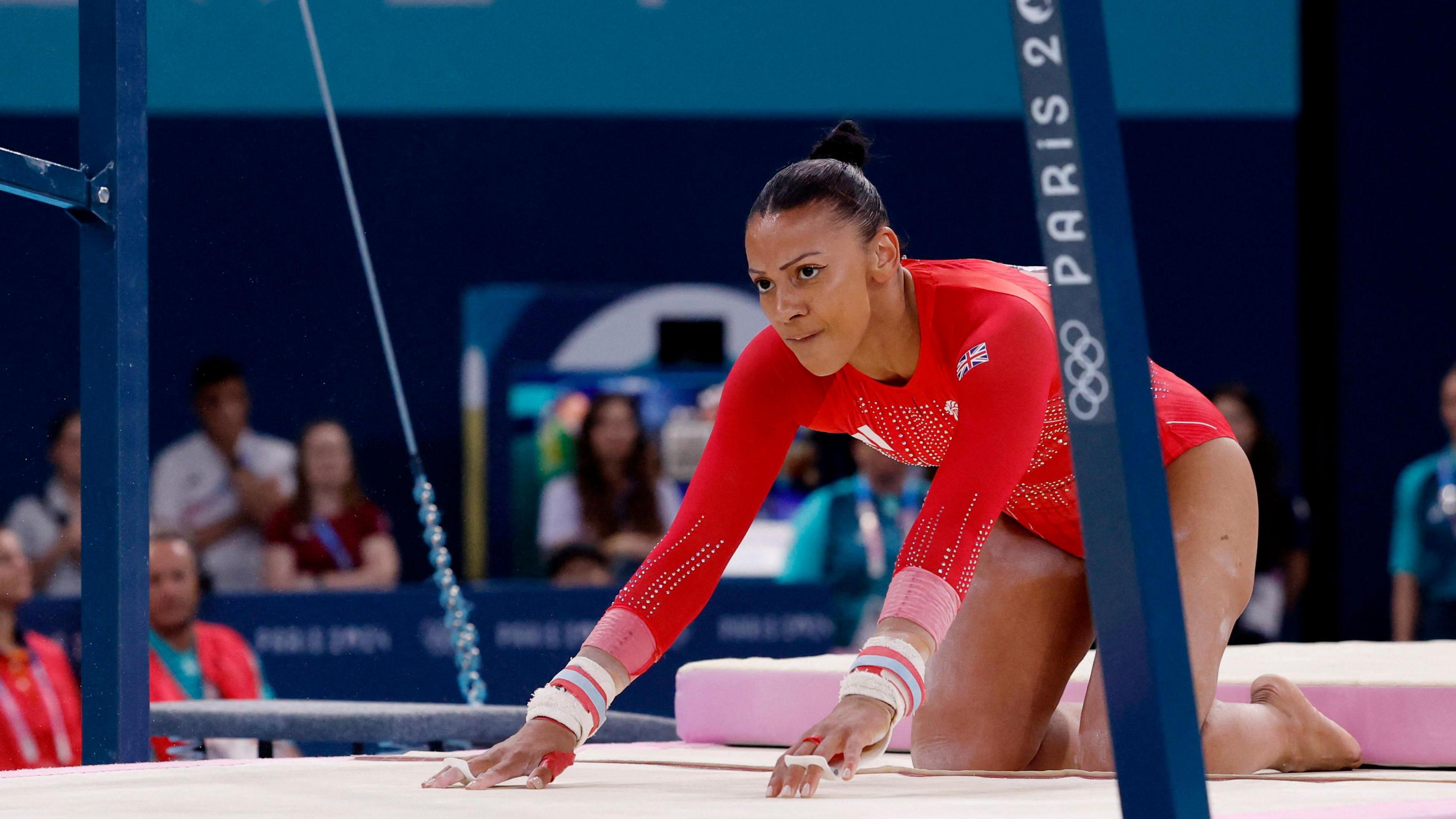 The moment Ms Downie fell during her final uneven bar routine