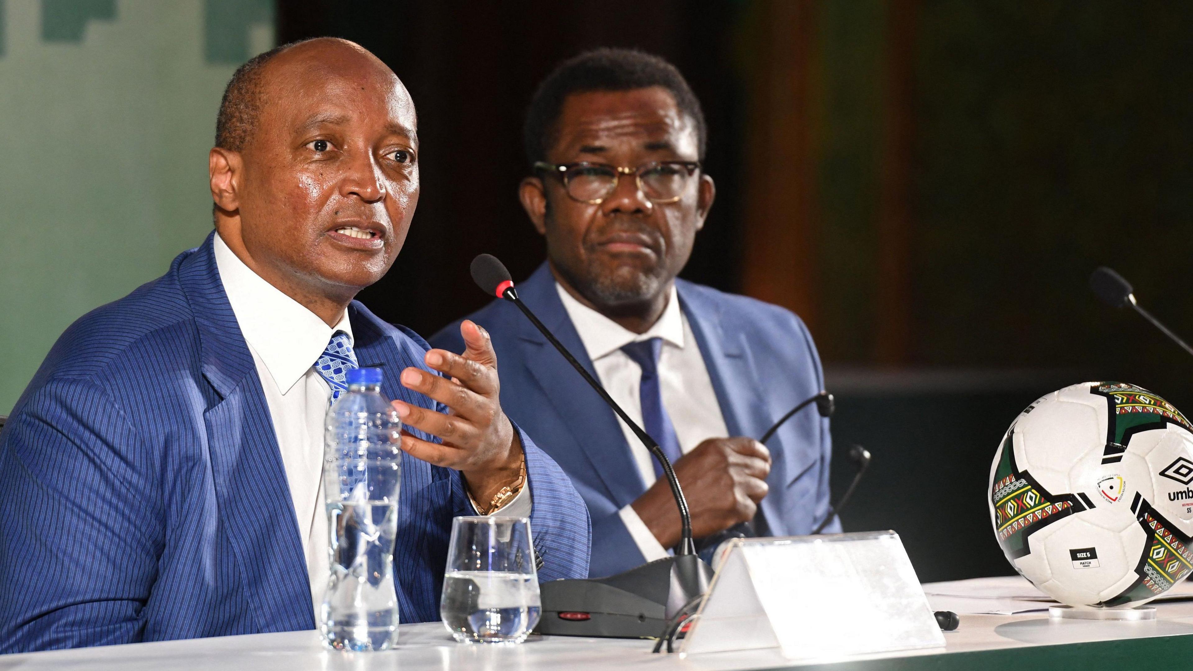 Caf president Patrice Motsepe (left) and secretary general Veron Mosengo-Omba (right) give a press conference during the Confederation of African Football's extraordinary general assembly in Cairo on November 26, 2021.