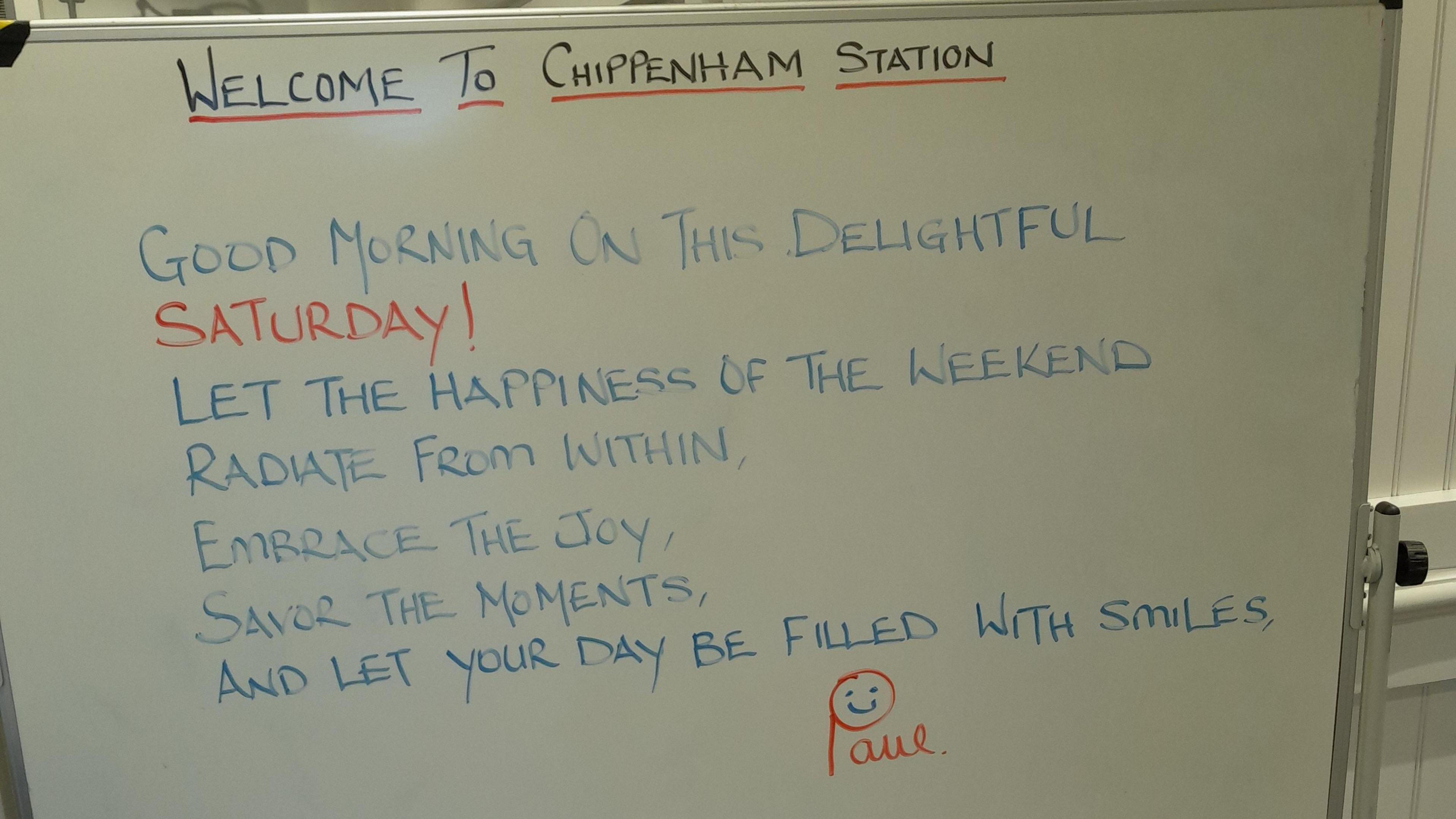 A whiteboard message board that says Welcome to Chippenham Station, along with a positive quote for Saturday