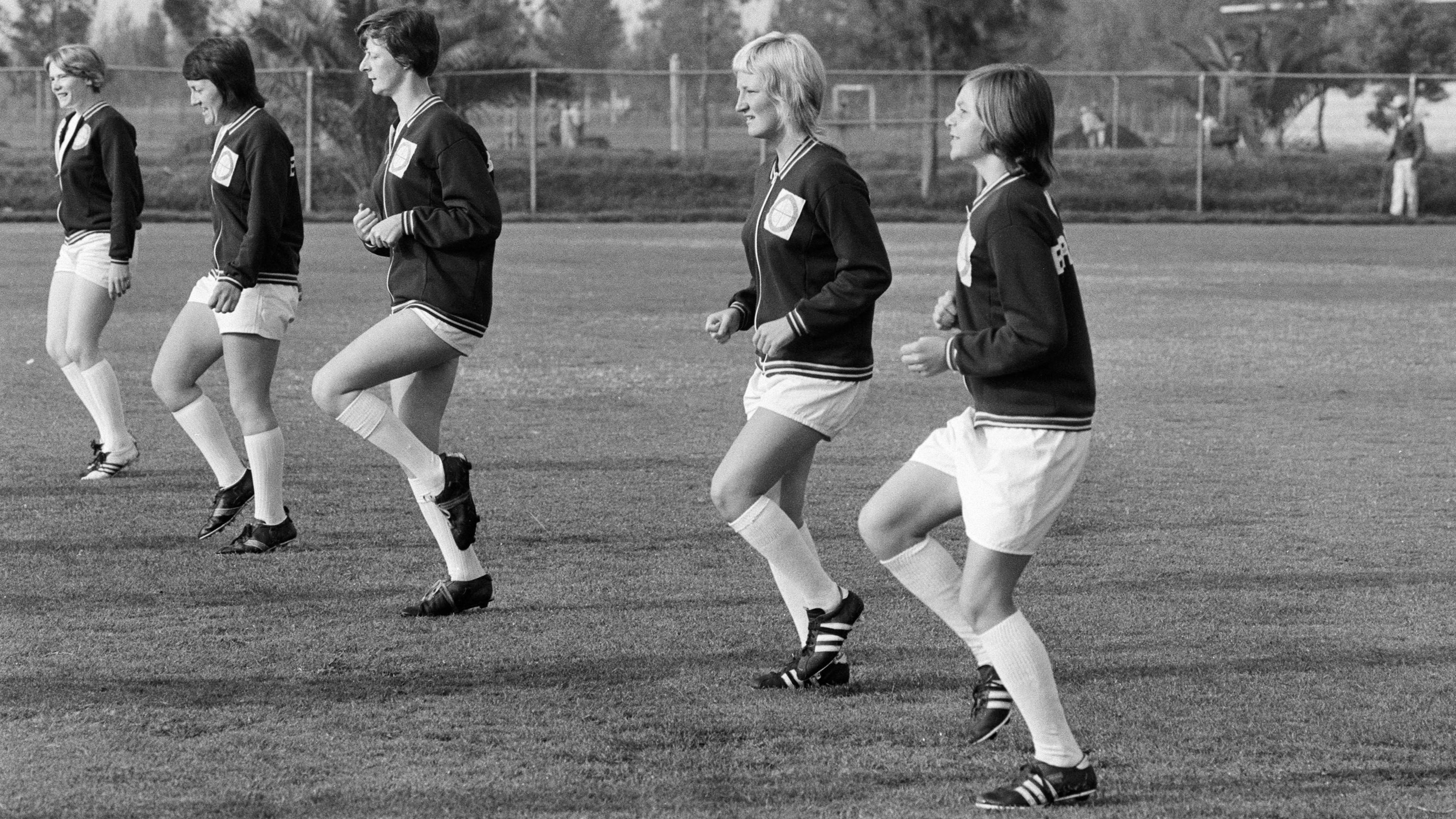 Five female footballers train on a pitch in Mexico City ahead of their match in Copa 71