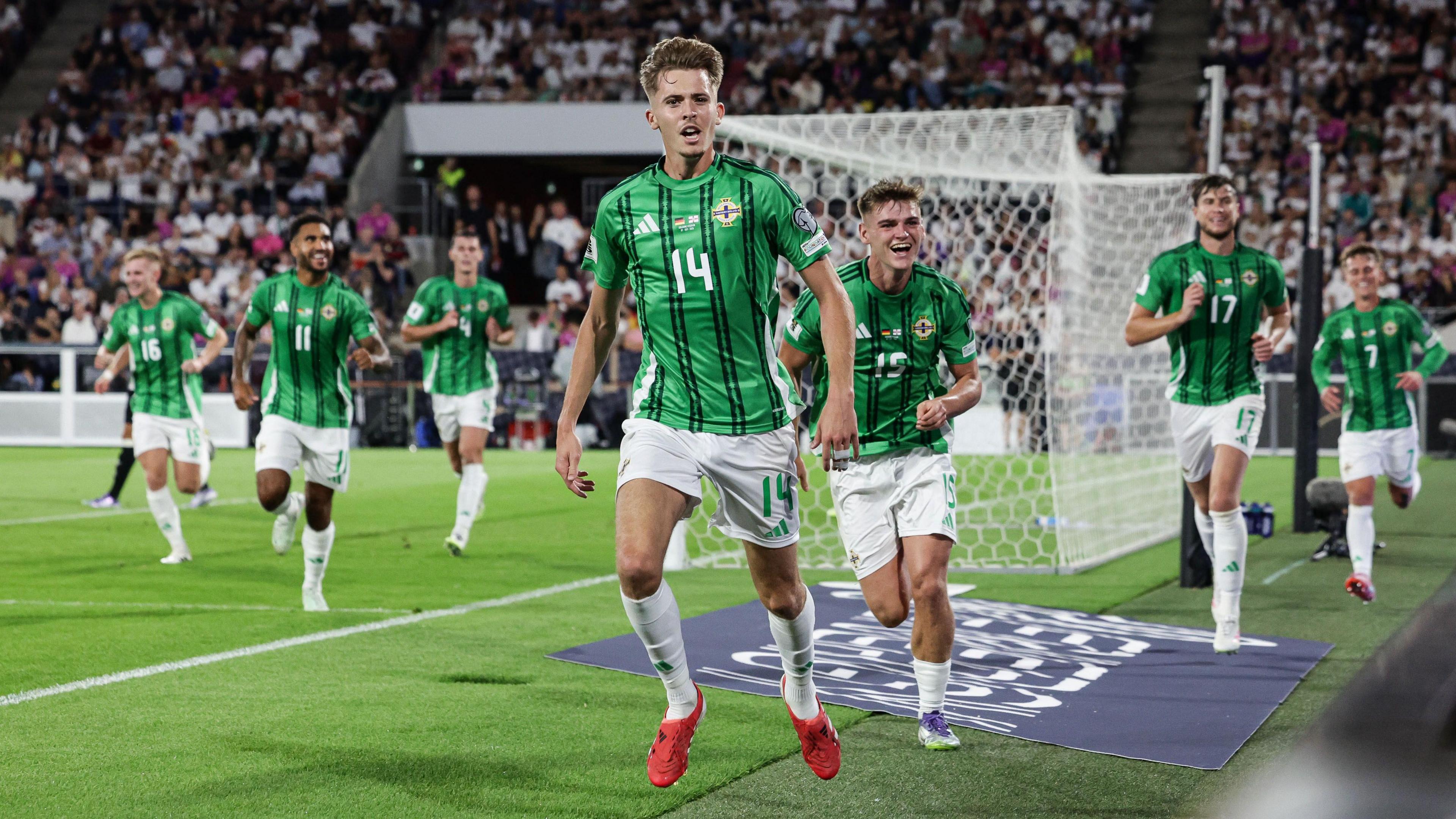 Isaac Price celebrates against Germany