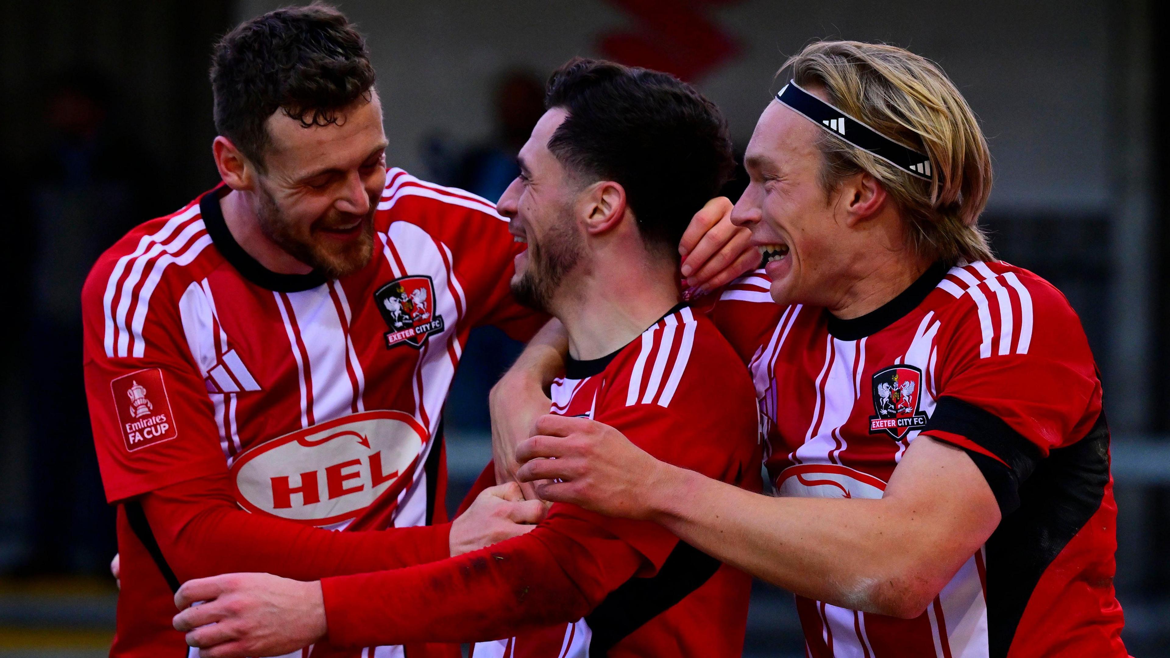 Exeter City celebrate scoring against Wycombe Wanderers in the FA Cup
