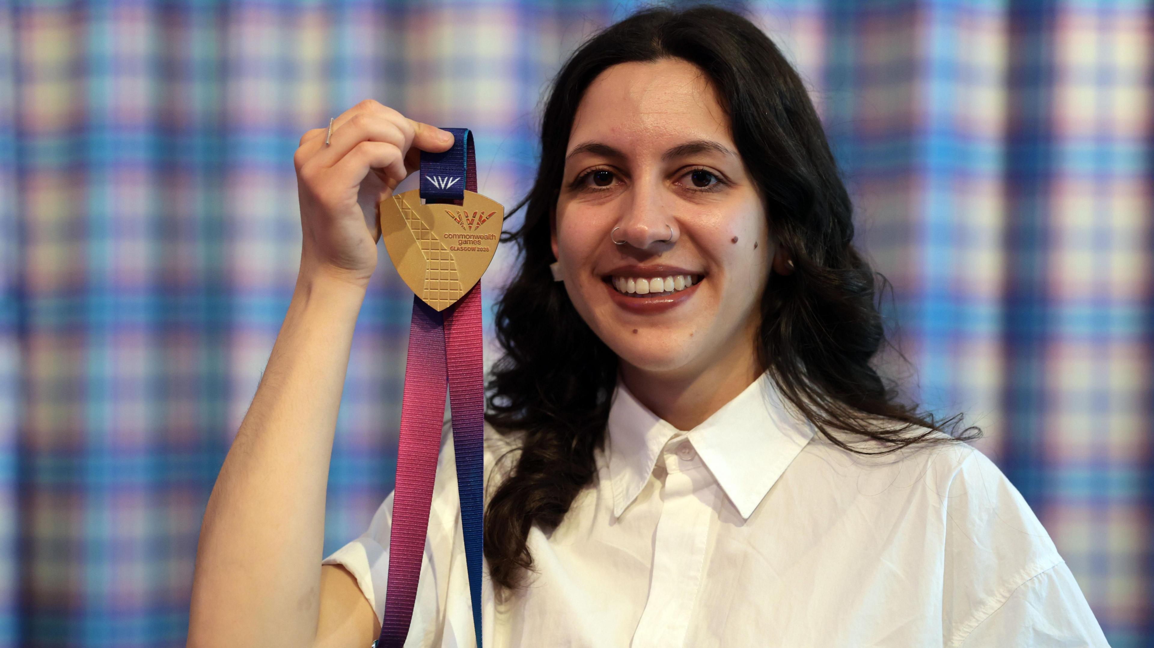 Militsa Milenkova holding one of the medals