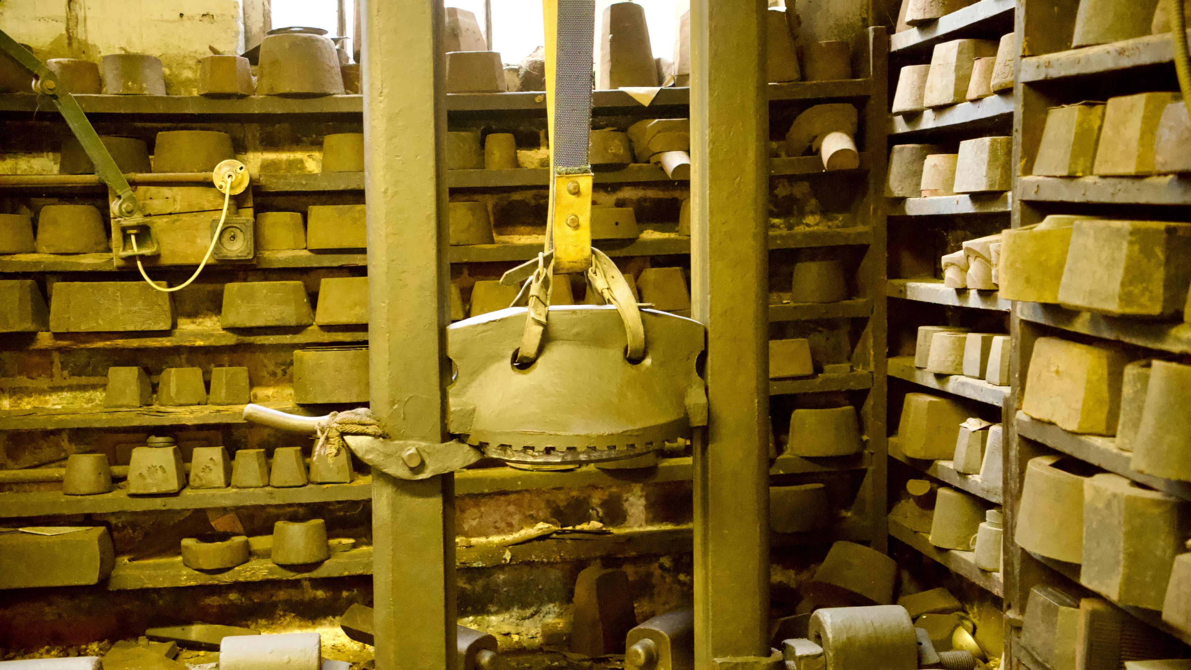 The interior of an old silver factory with stamps and presses. The interior is as if the factory was still open today