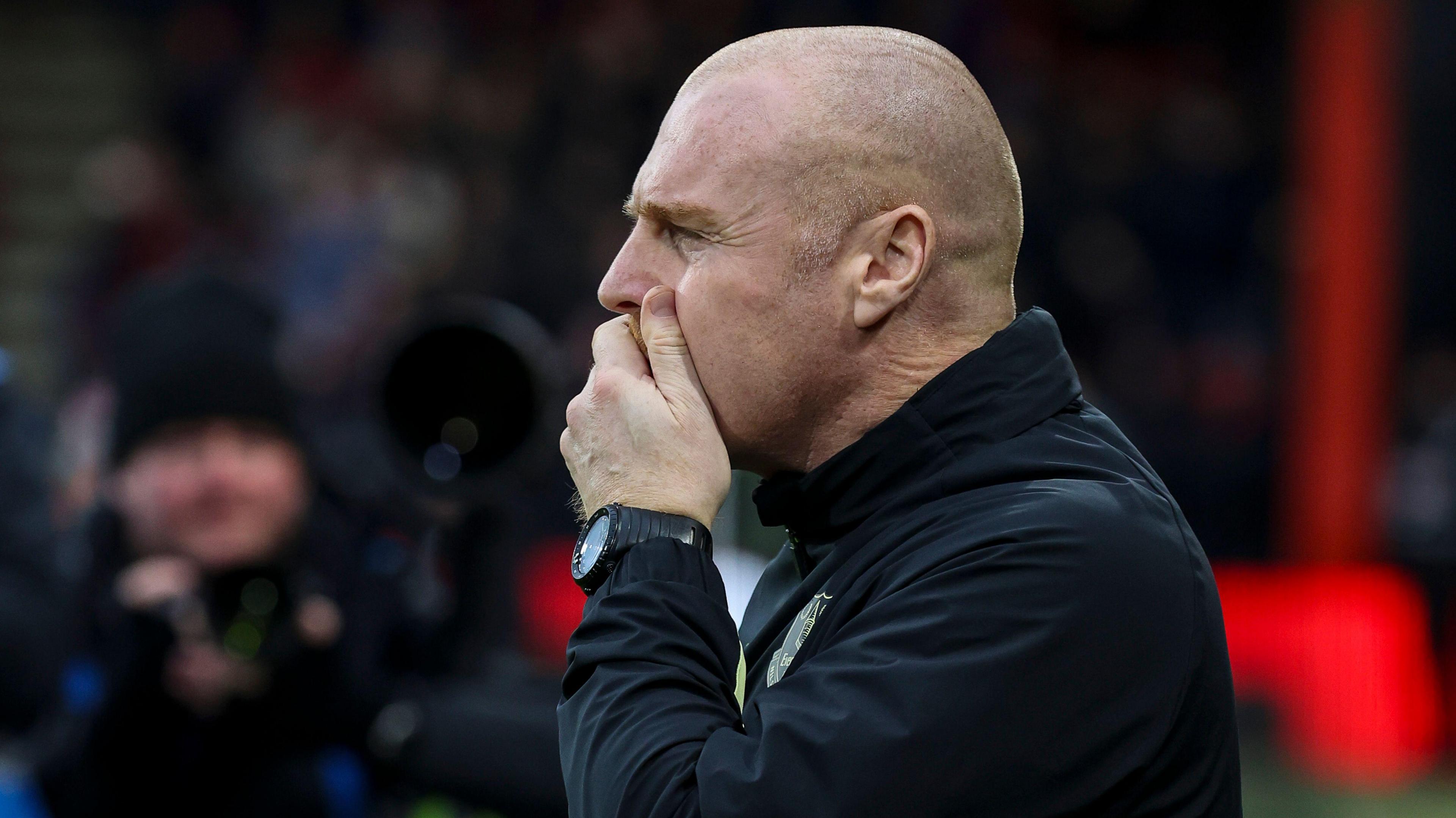 Sean Dyche clasps his hand over his face