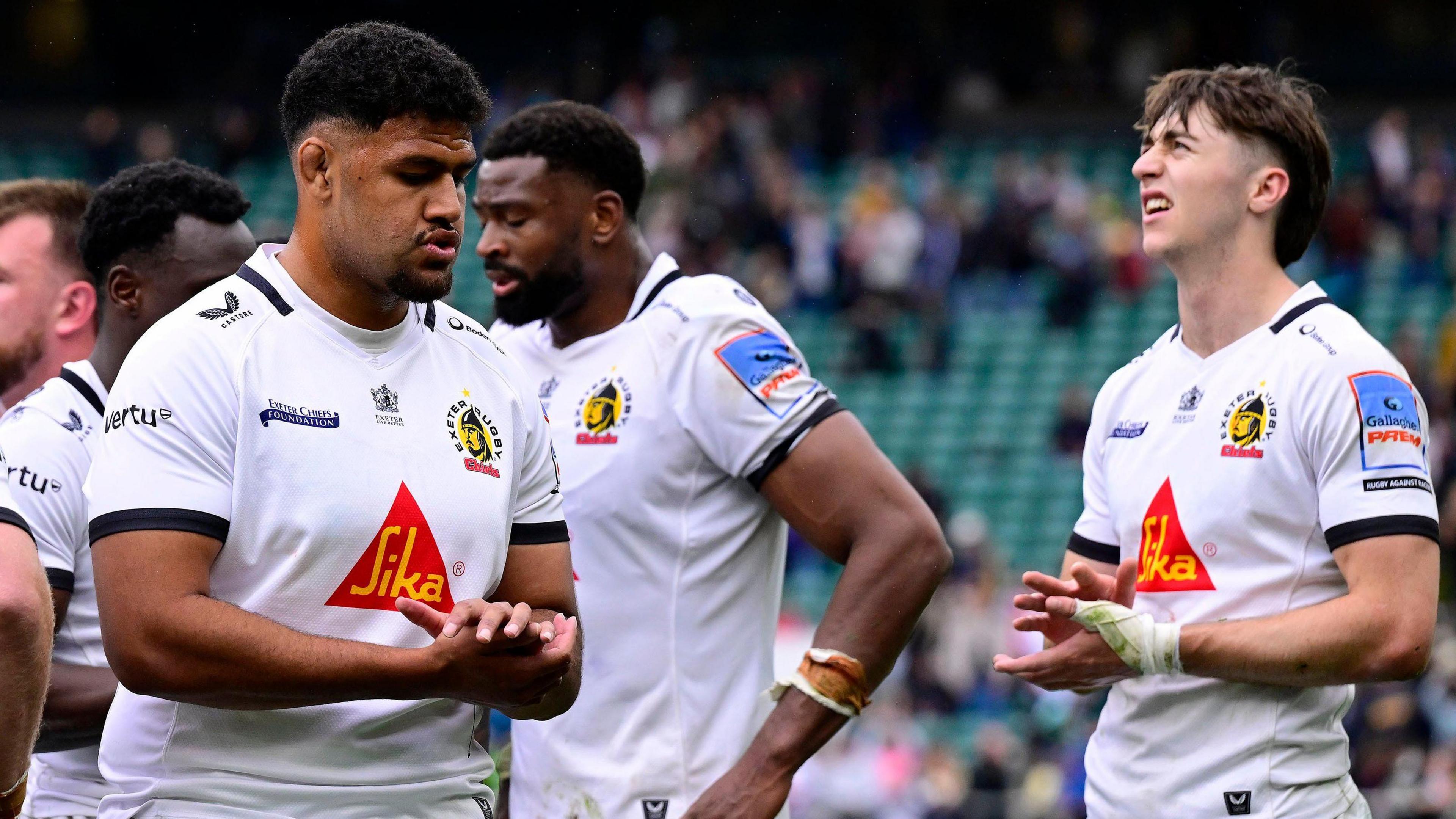 Dejected Exeter players