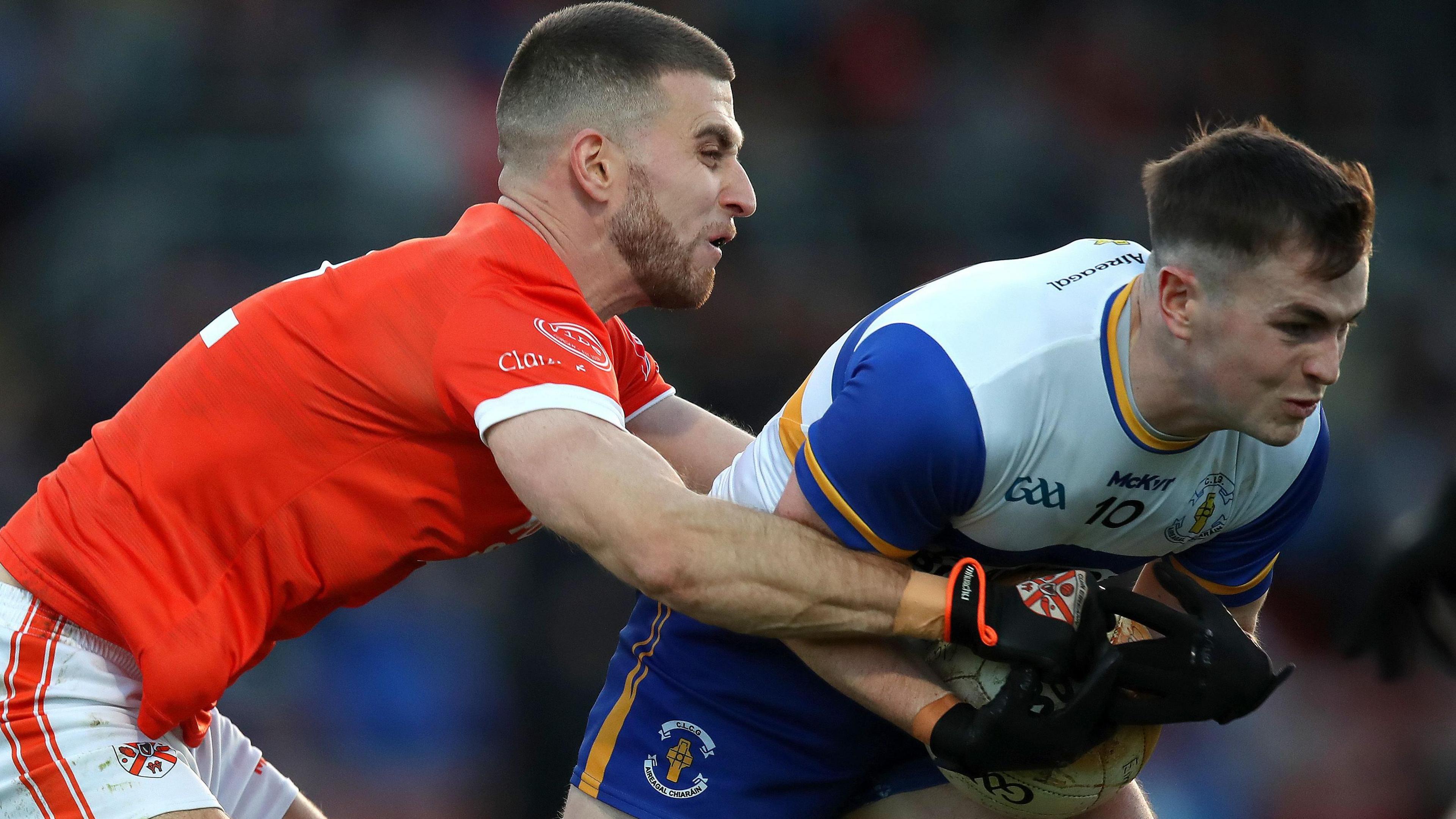 Clann Eireann's Shea Heffron attempts to get to grips with Errigal Ciaran's man of the match Ruairi Canavan at Pairc Esler