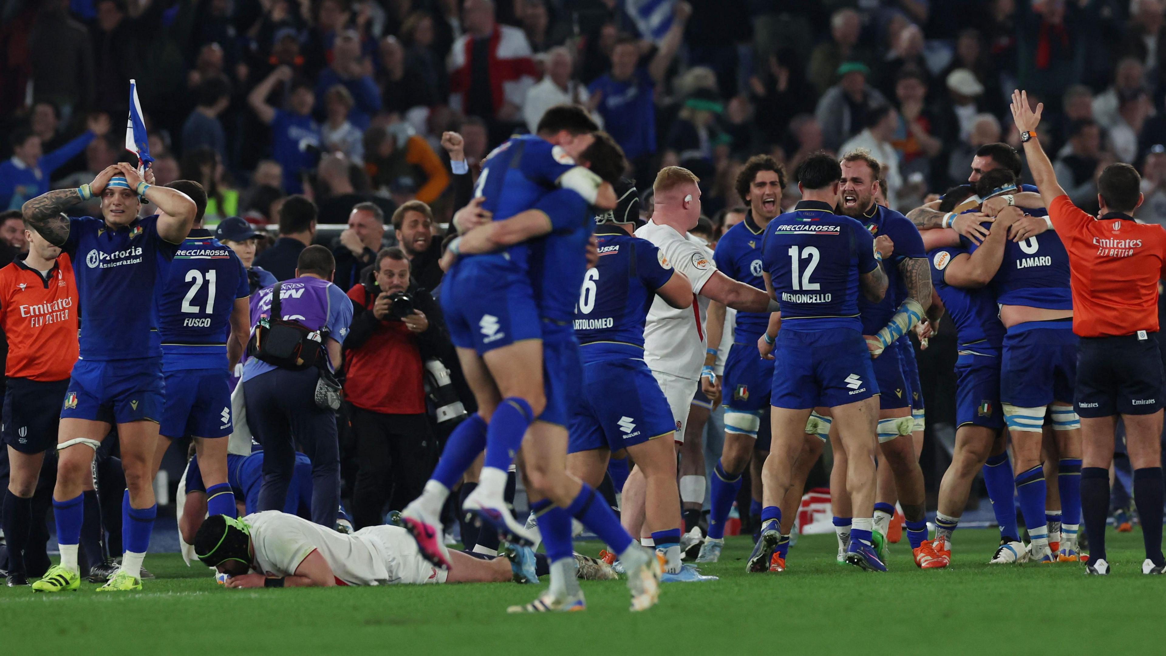 Italy celebrate beating England