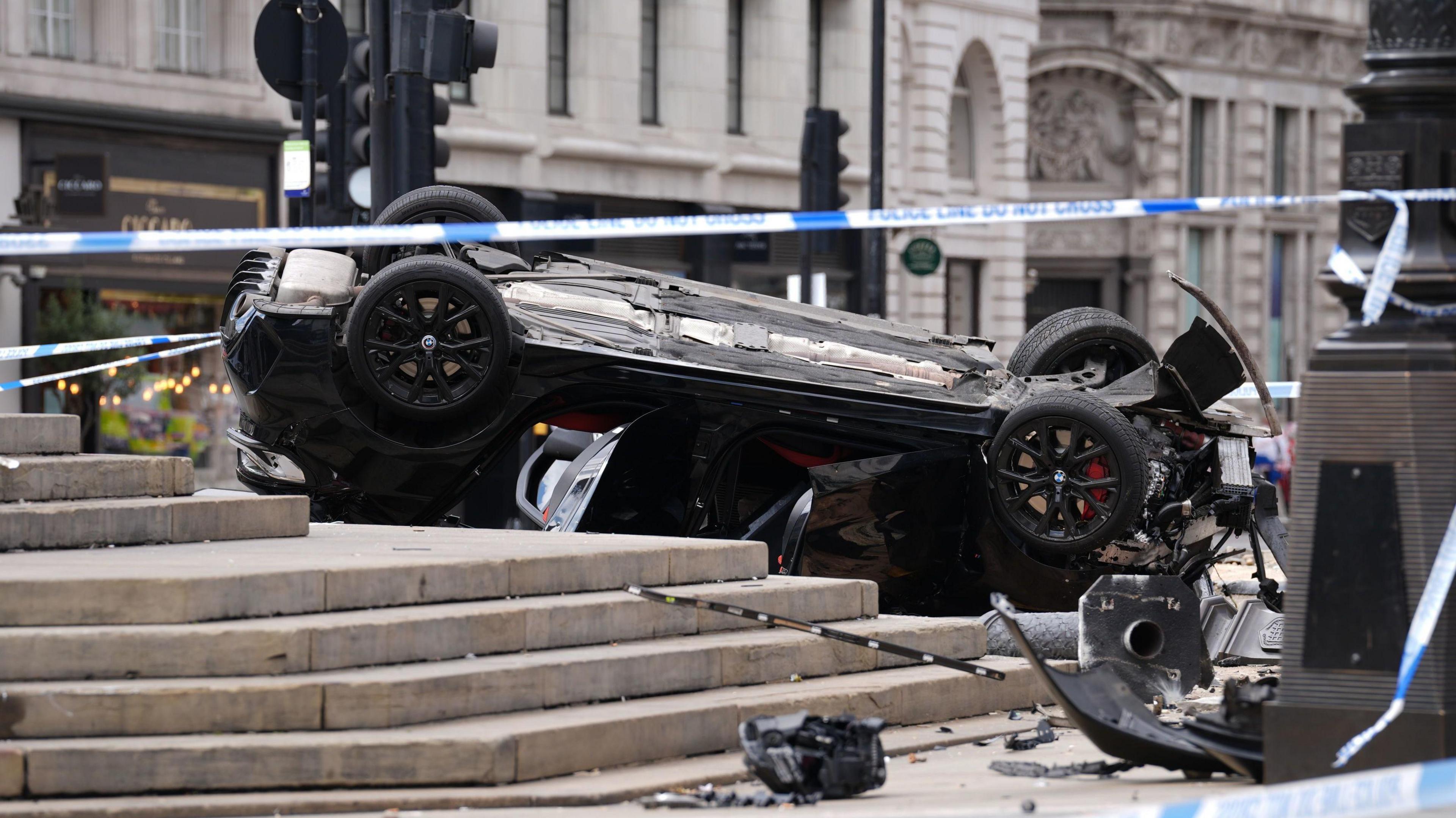 A black car crashed in Piccadilly Circus