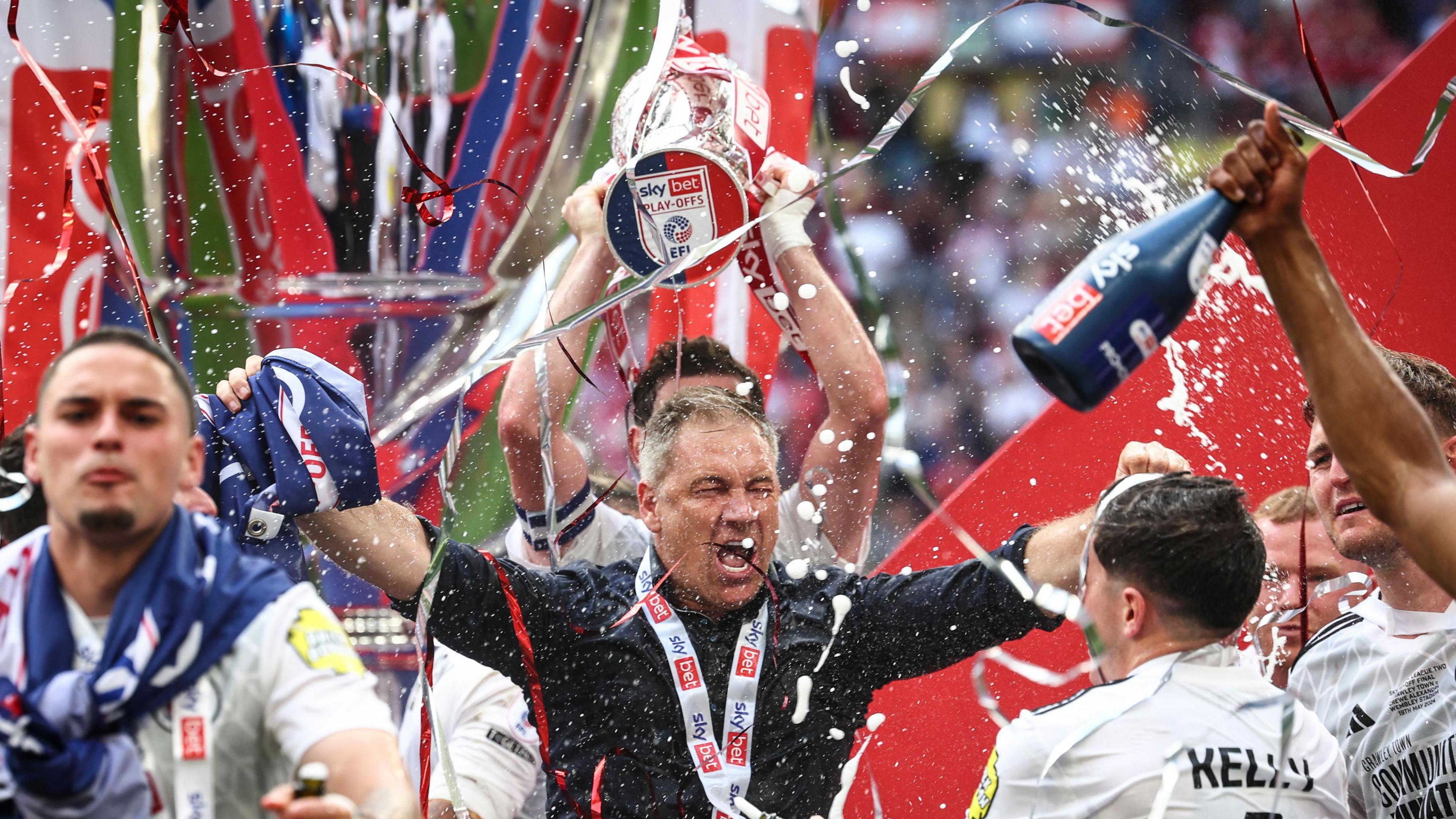 Crawley manager Scott Lindsey celebrating their play-off win at Wembley