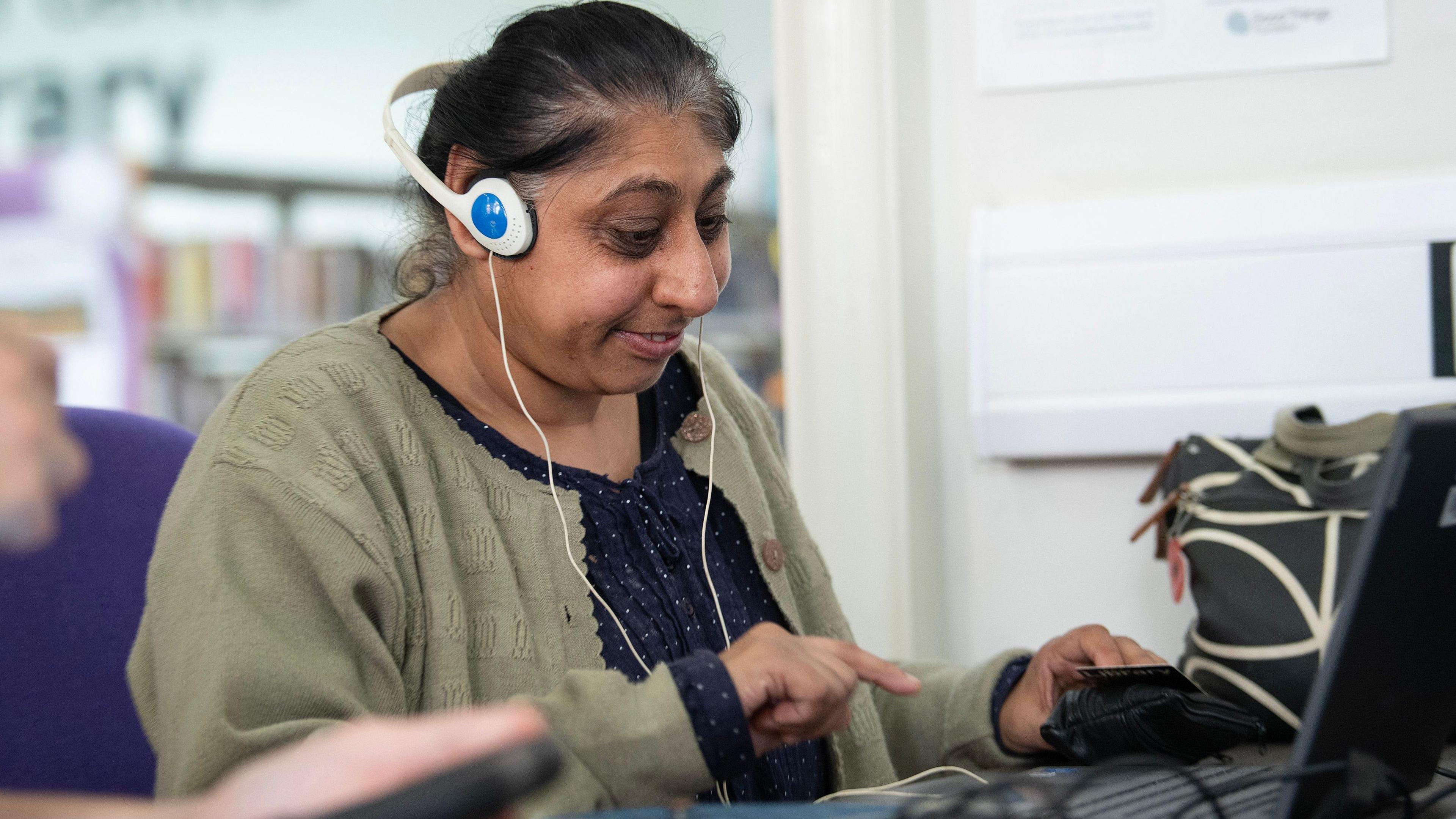 Woman using study area at a Leicester library