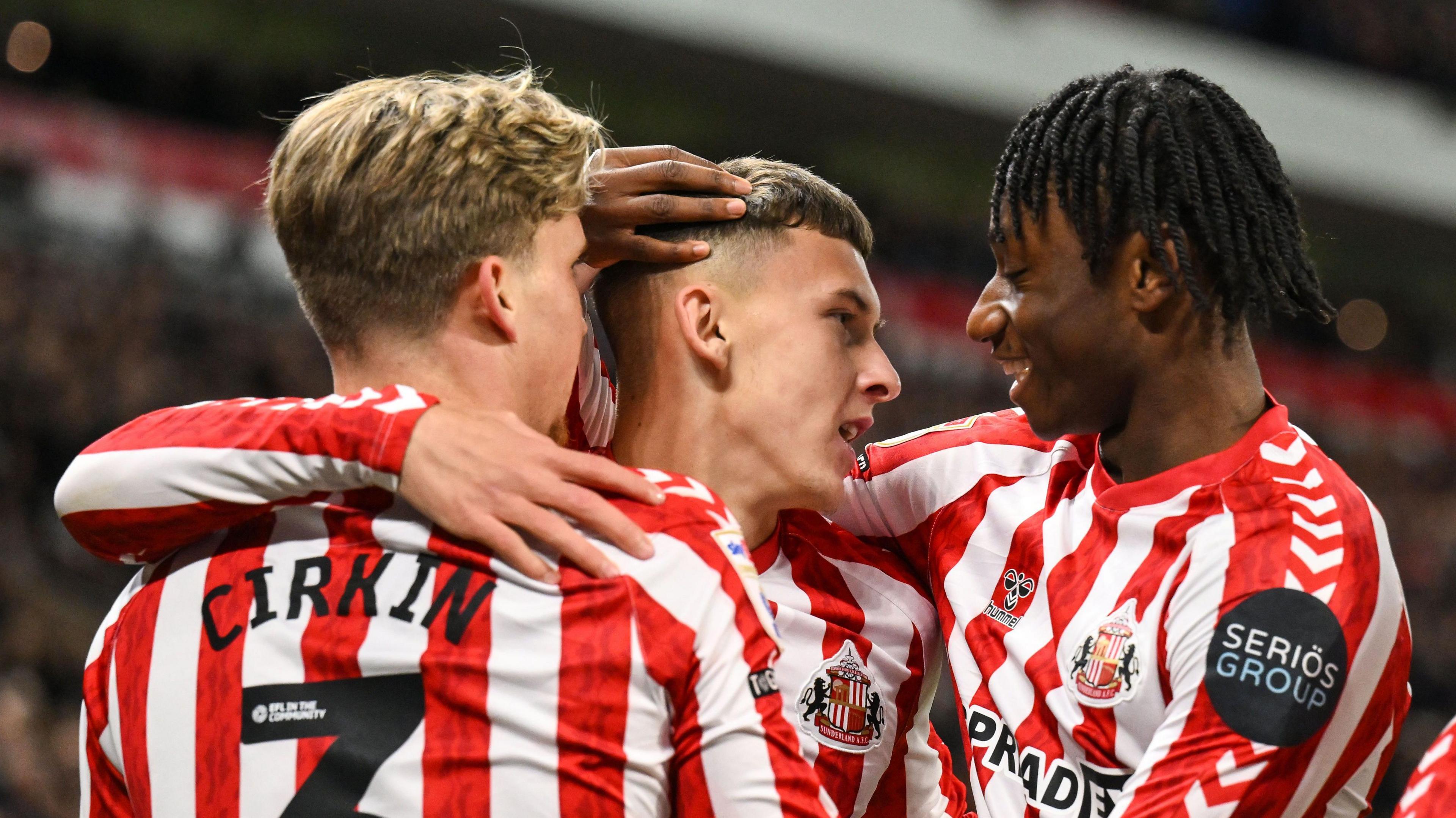 Chris Rigg celebrates with his team-mates