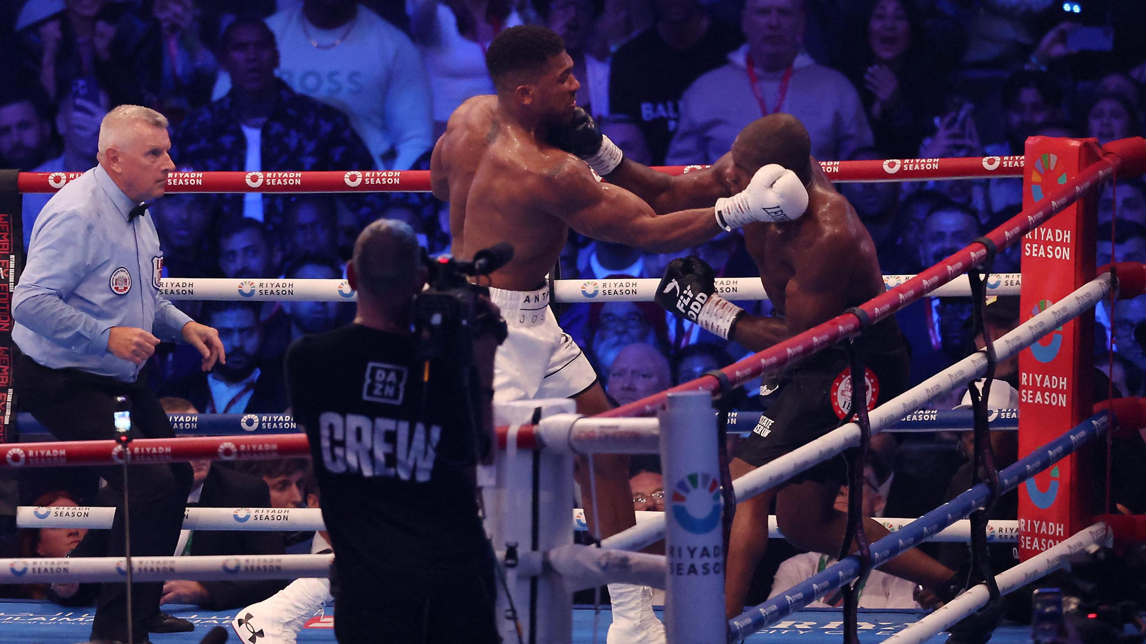 Anthony Joshua is punched on the chin by Daniel Dubois