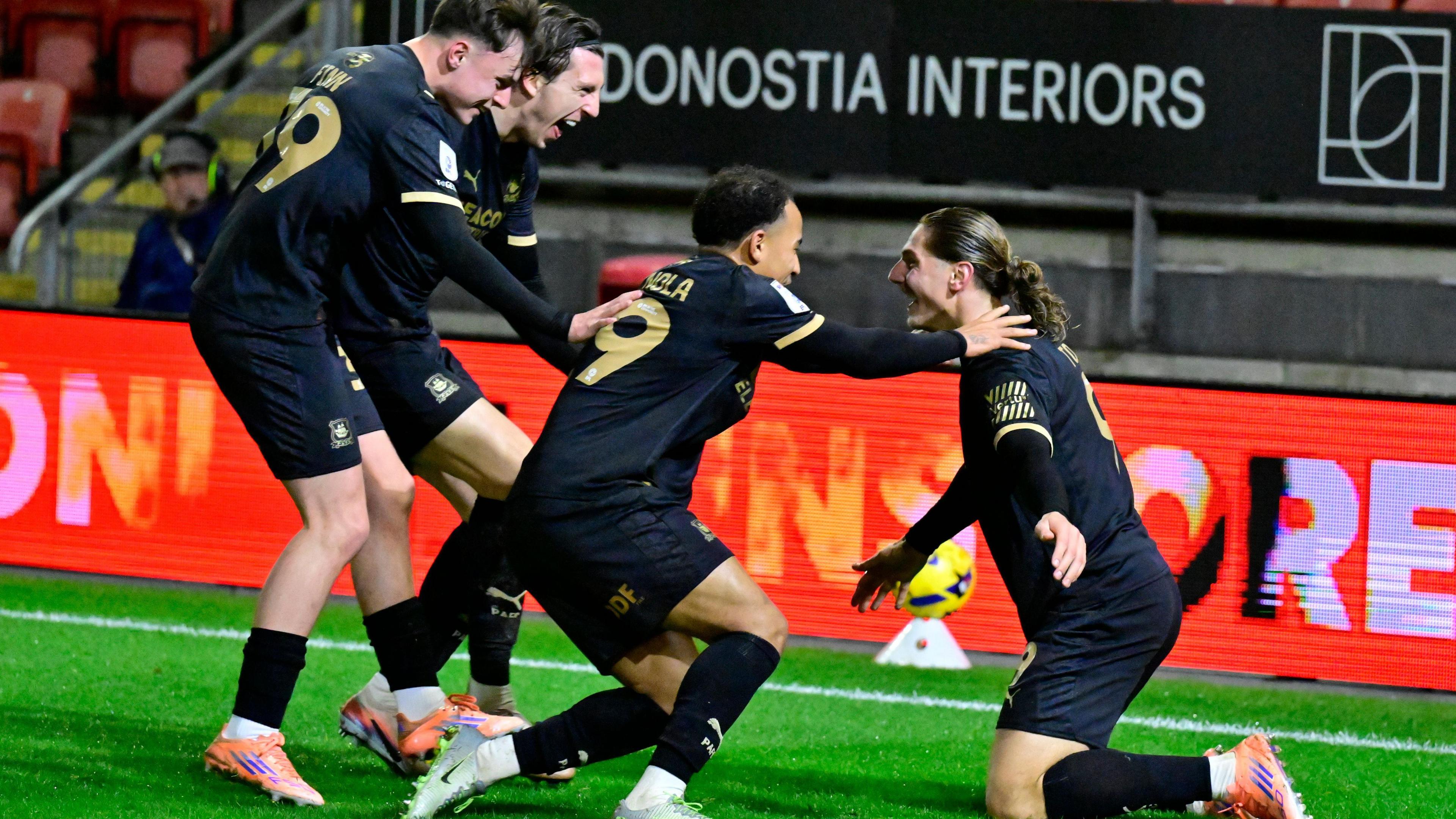 Footballer Lorent Tolaj celebrates a goal for Plymouth Argyle  Football Club in the Vertu Trophy at Leyton Orient