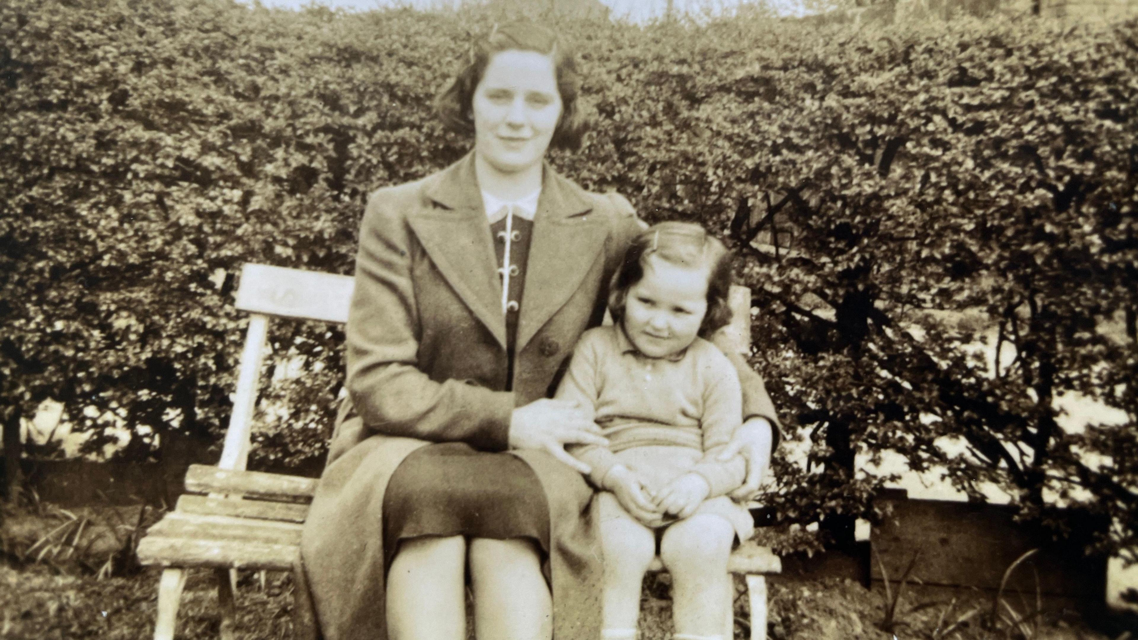 A black-and-white photo of two evacuees