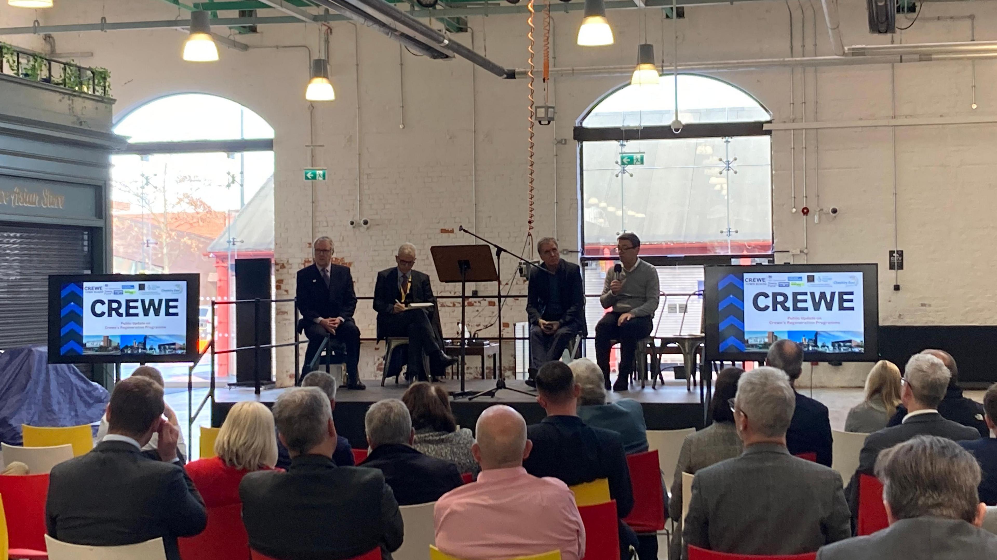 Cheshire East Council leaders on stage with Andy Burnham and Steve Rotheram