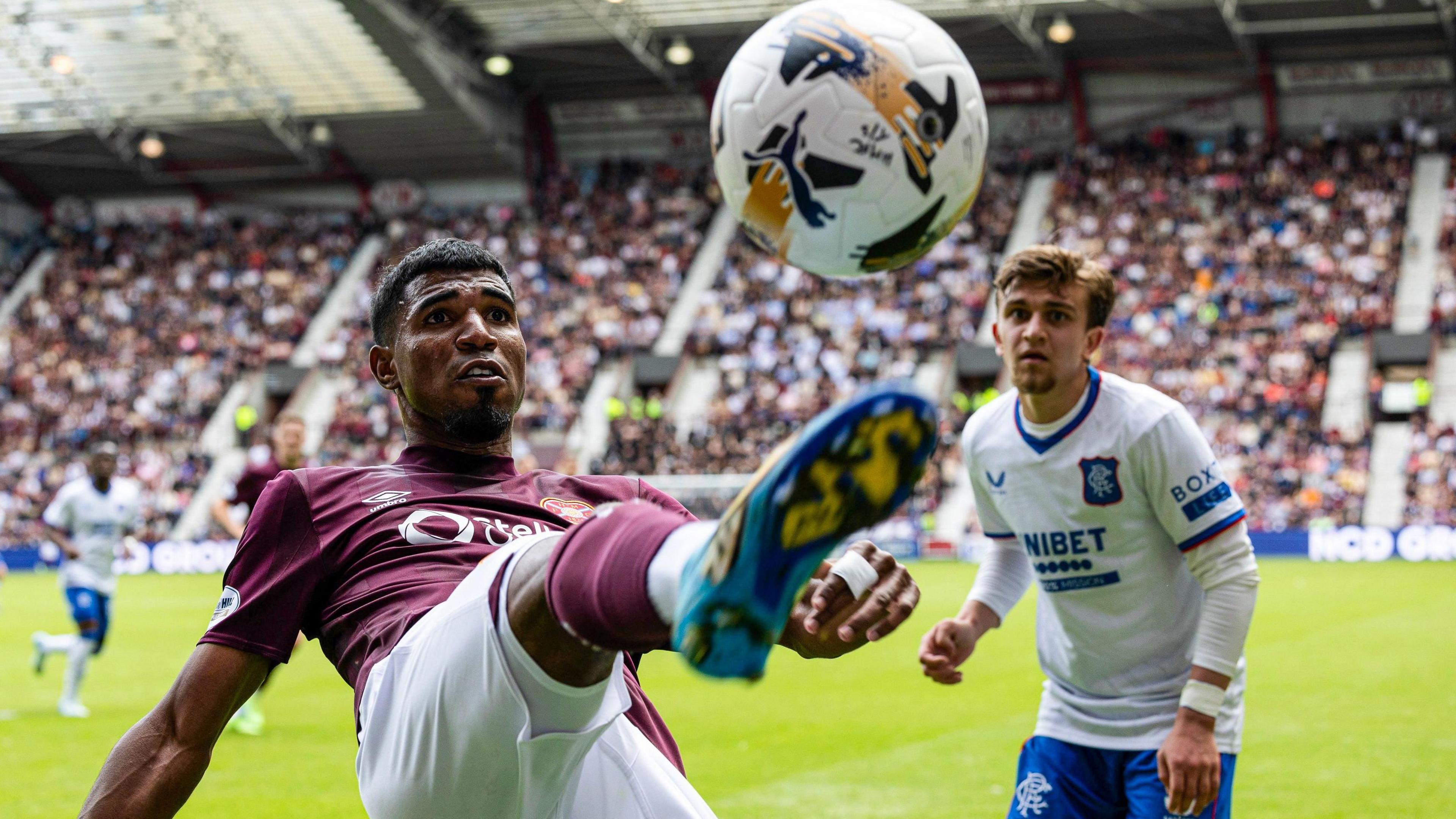 Hearts' Gerald Taylor and Rangers' Ridvan Yilmaz