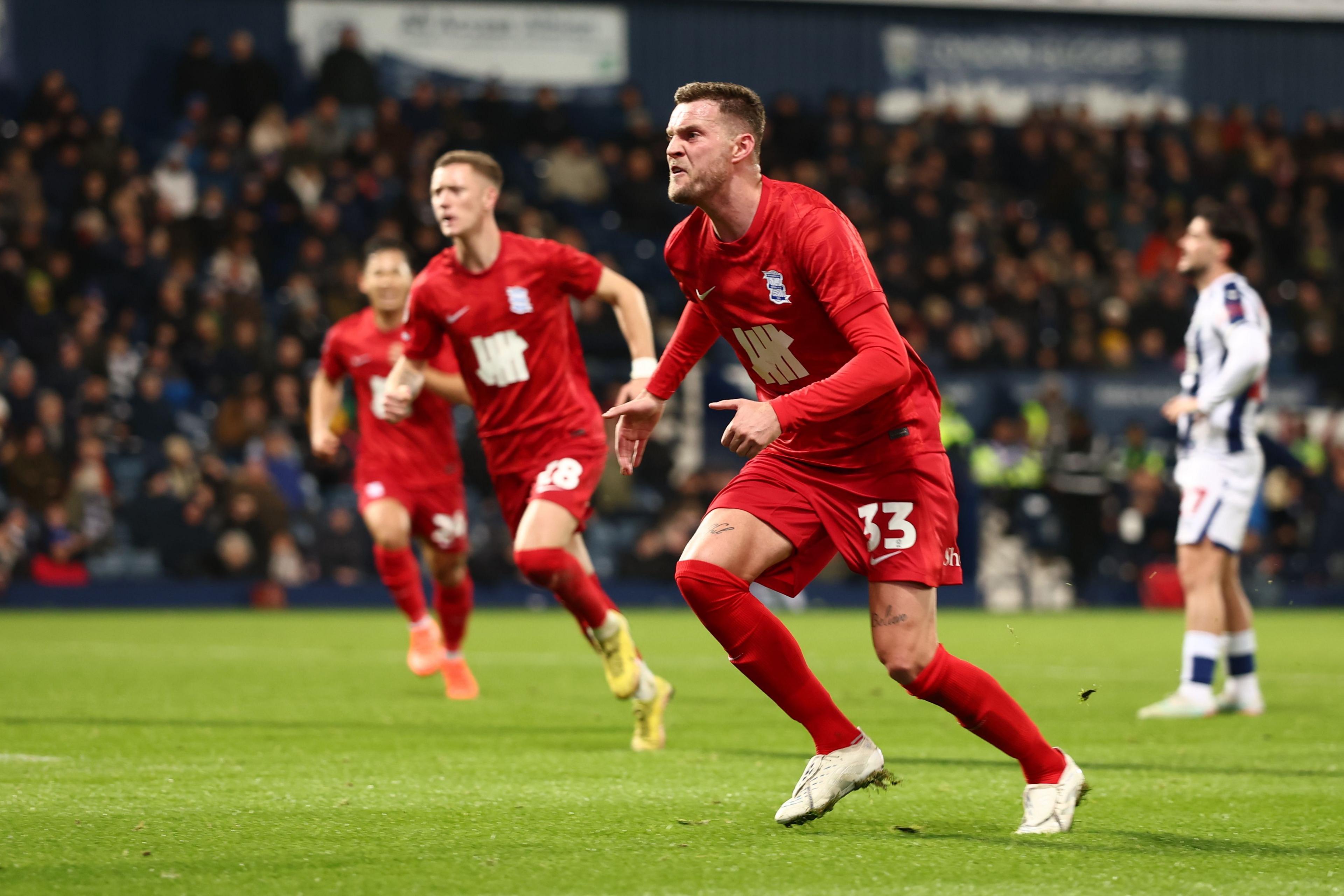 Marvin Ducksch (in red shirt) celebrates his late equaliser against West Bromwich Albion at The Hawthorns in November