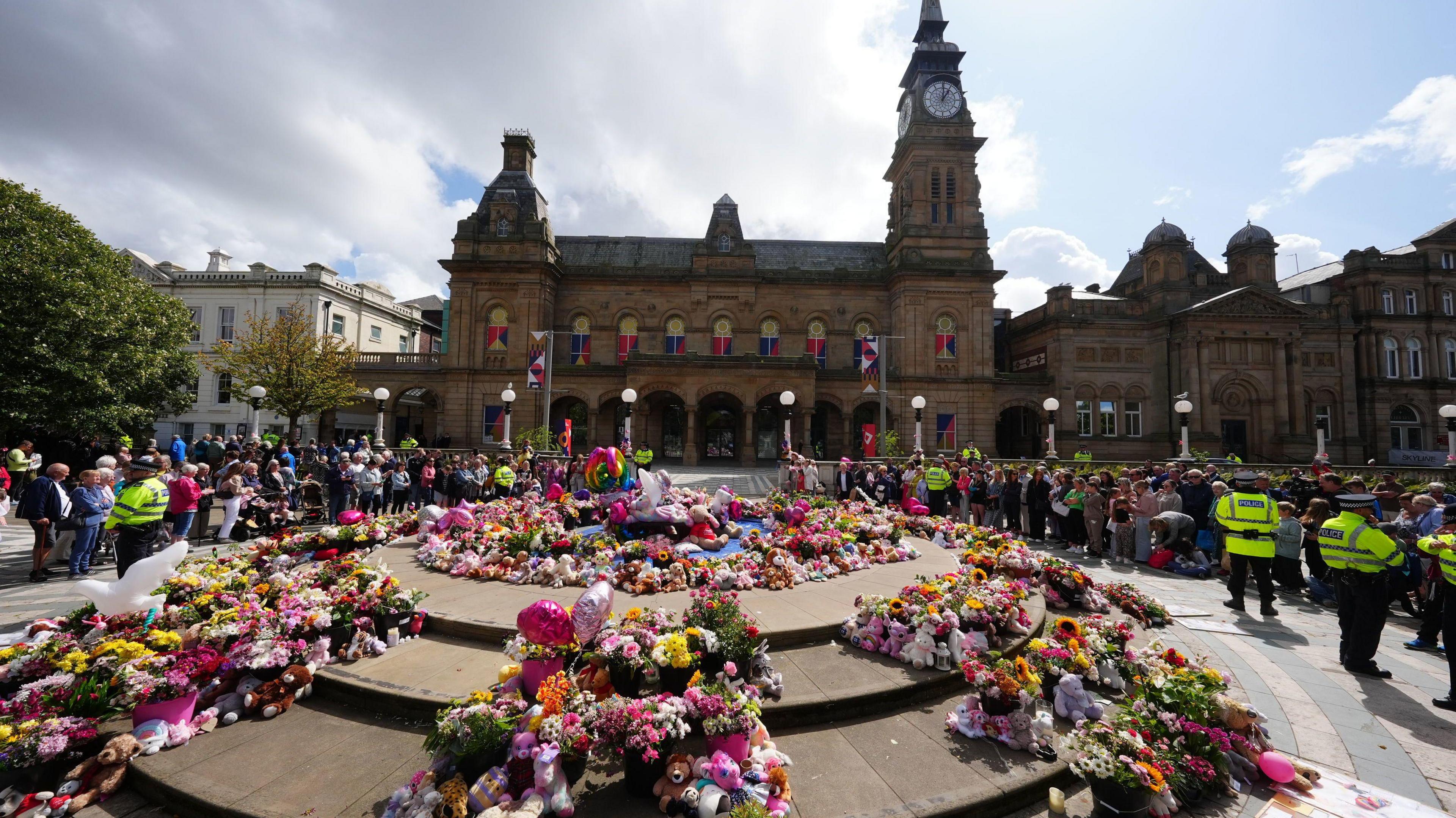 Flowers laid for victims outside Southport Town Hall in the aftermath of the knife attacks