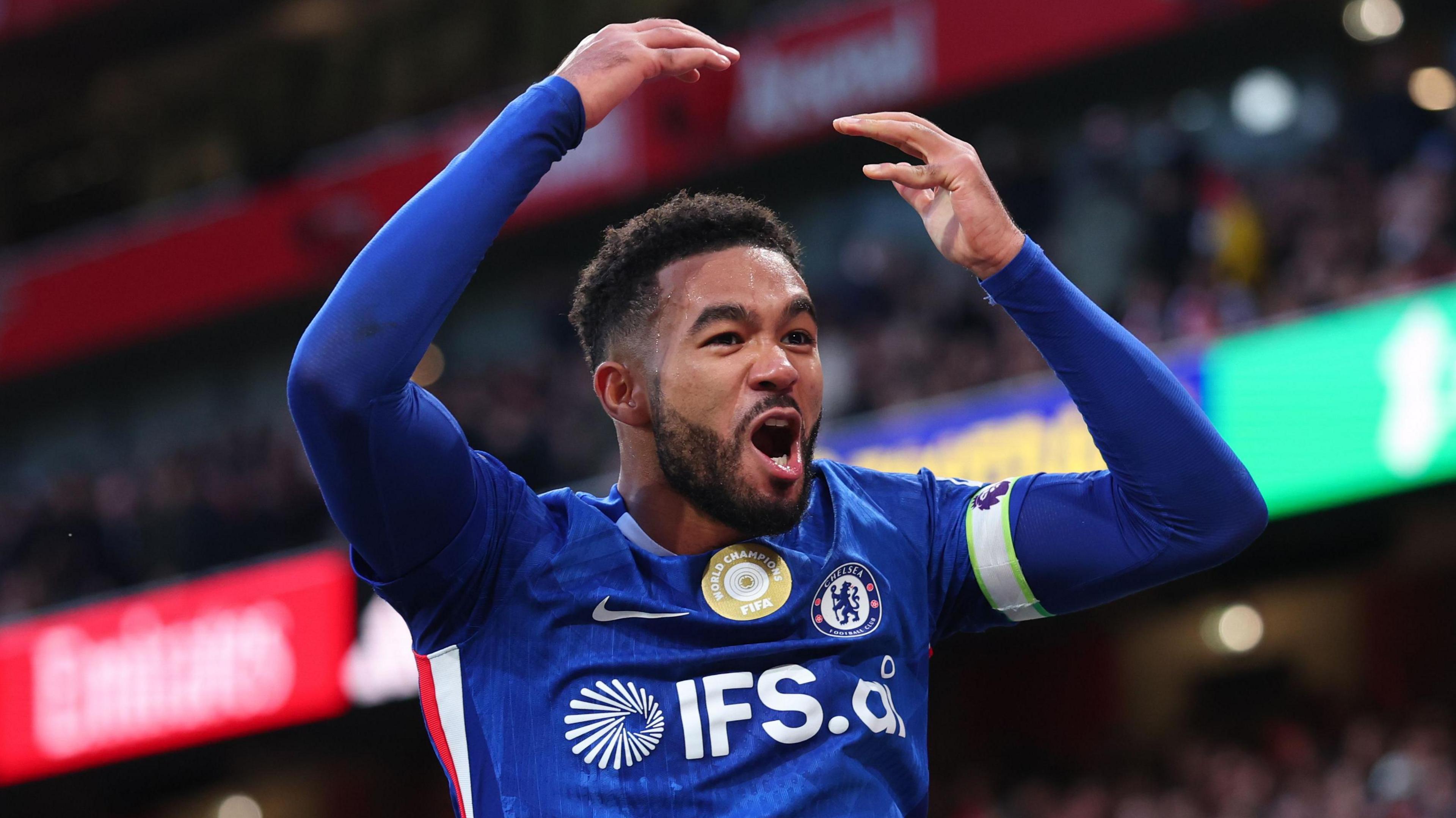 Reece James celebrates during a Chelsea match