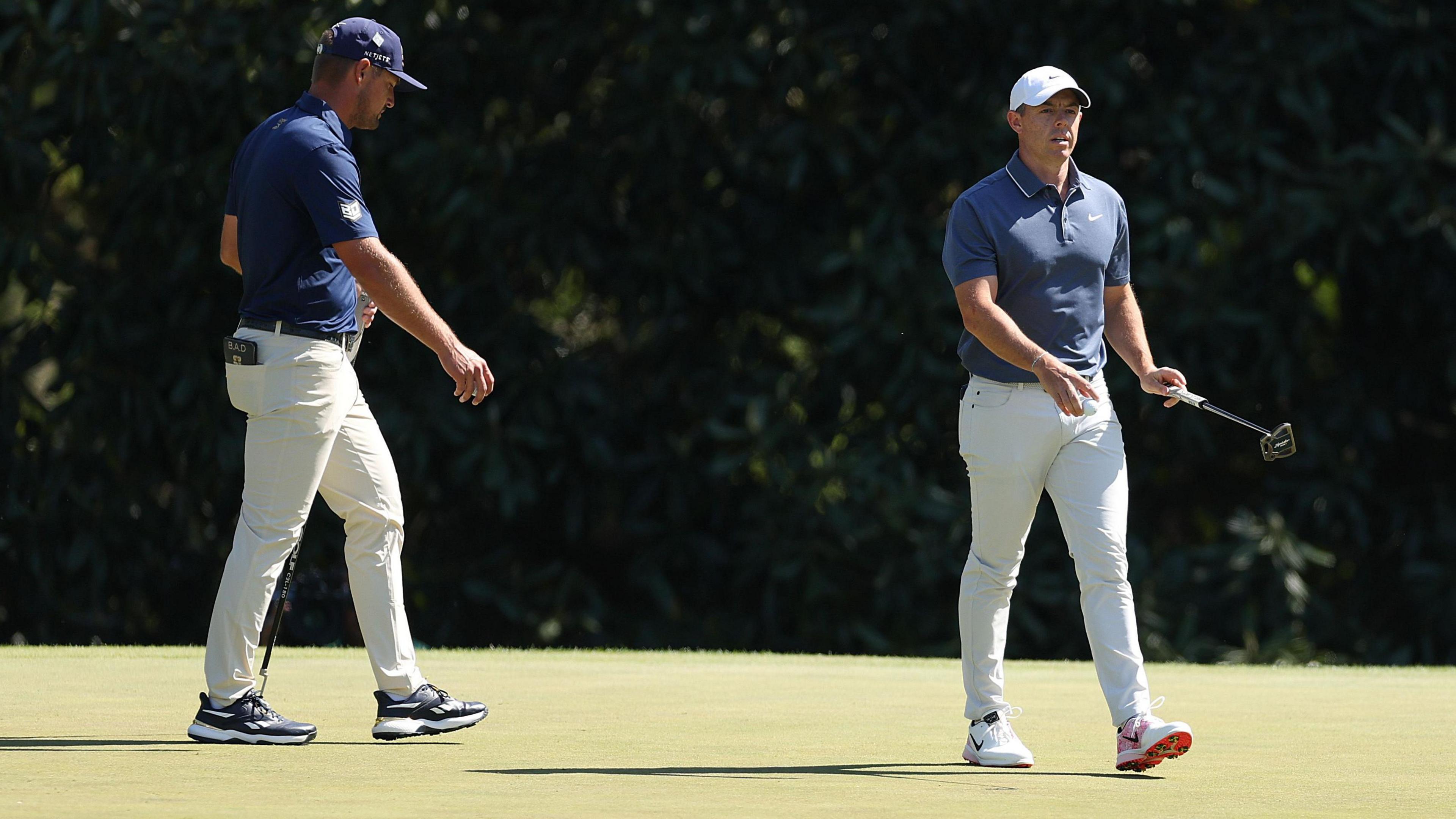 Bryson DeChambeau and Rory McIlroy during the final round as the Masters