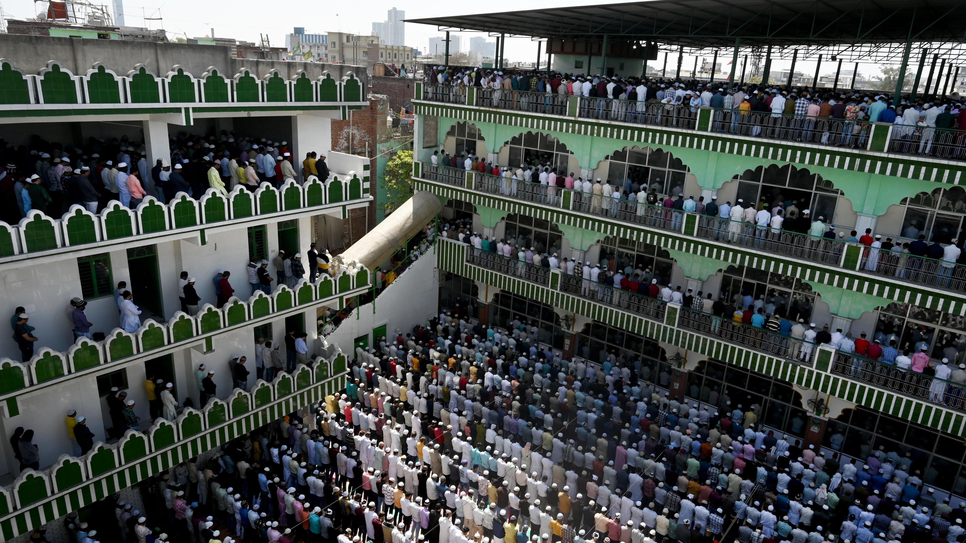 NOIDA, INDIA - MARCH 15: Muslim devotees offer prayers on the occasion of first Friday of the holy month of Ramadan at a mosque at Sector 8, on March 15, 2024 in Noida, India. Every year, the ninth month of the Islamic calendar is observed with a lot of dedication, community service and peace by the Muslim community all over the world. Muslims, during this time of the year, keep fast from dawn to sunset. They consume a pre-dawn meal suhur, and then break their fast after sunset with dates and water. (Photo by Sunil Ghosh/Hindustan Times via Getty Images)
