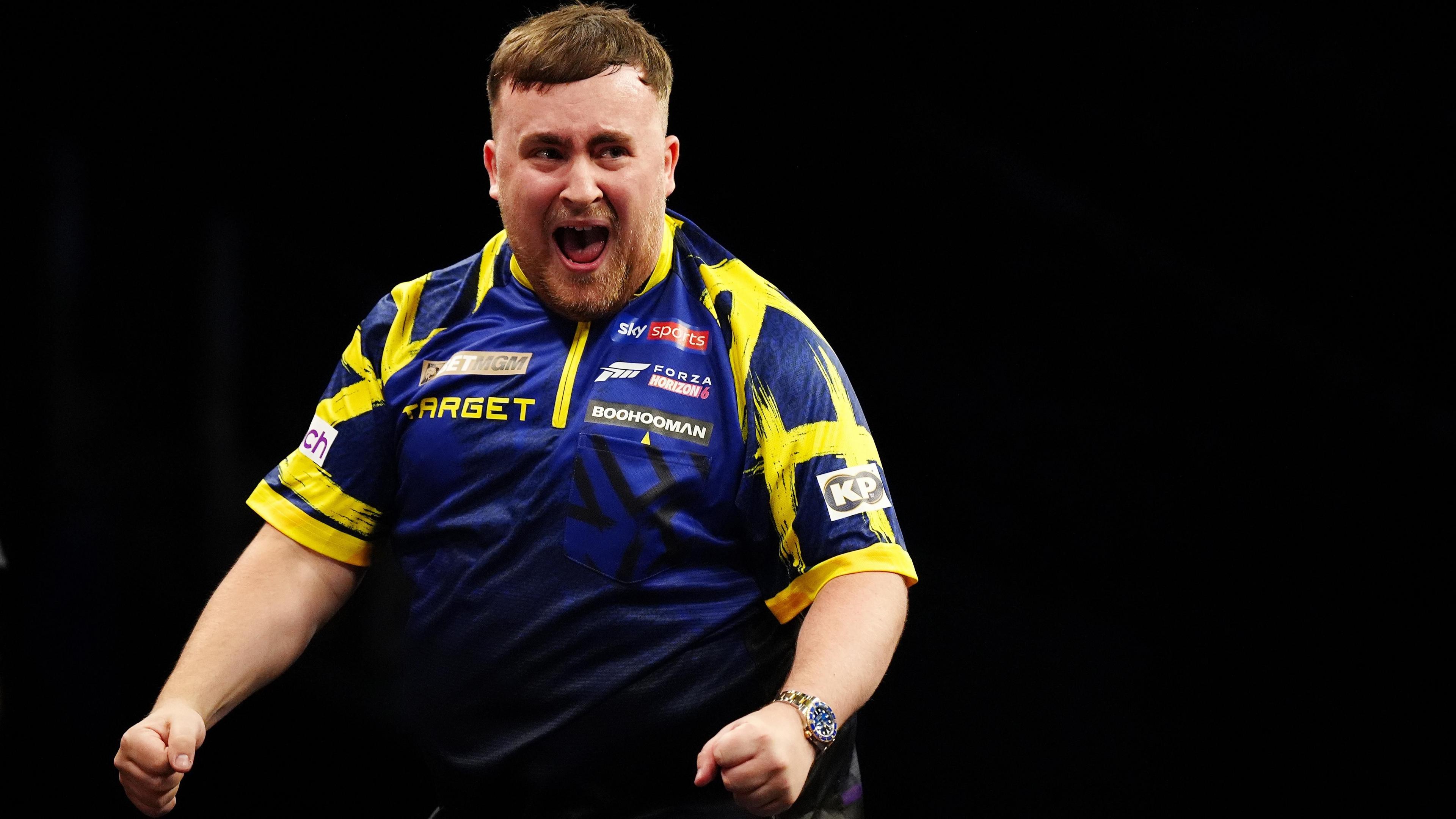 Luke Littler celebrates