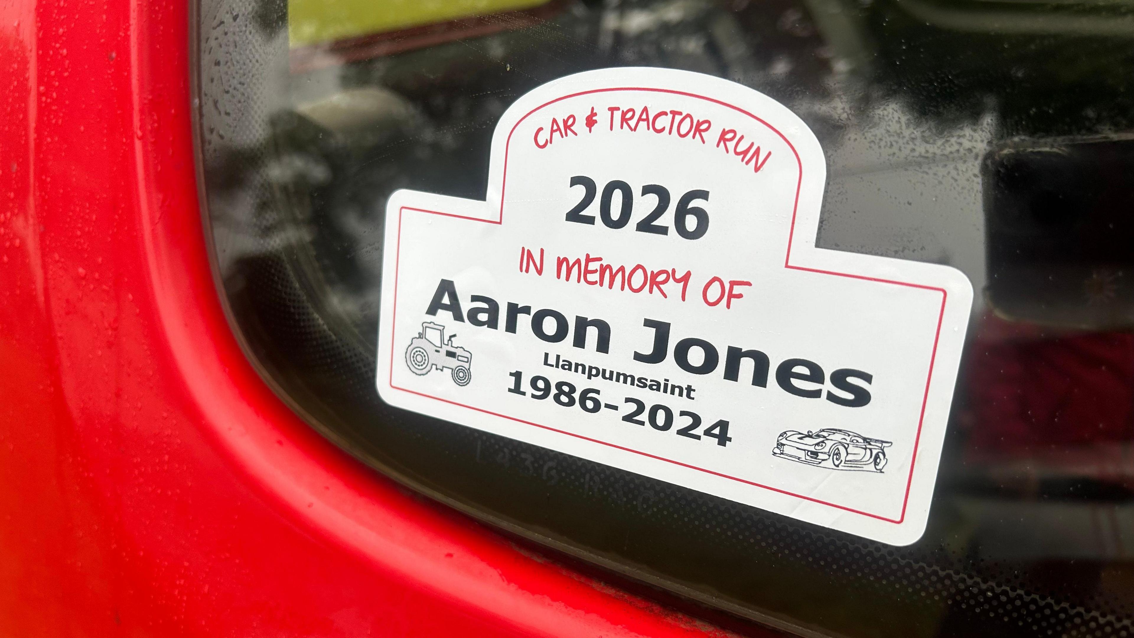 Sticer o'r digwyddiad i Aaron Jones