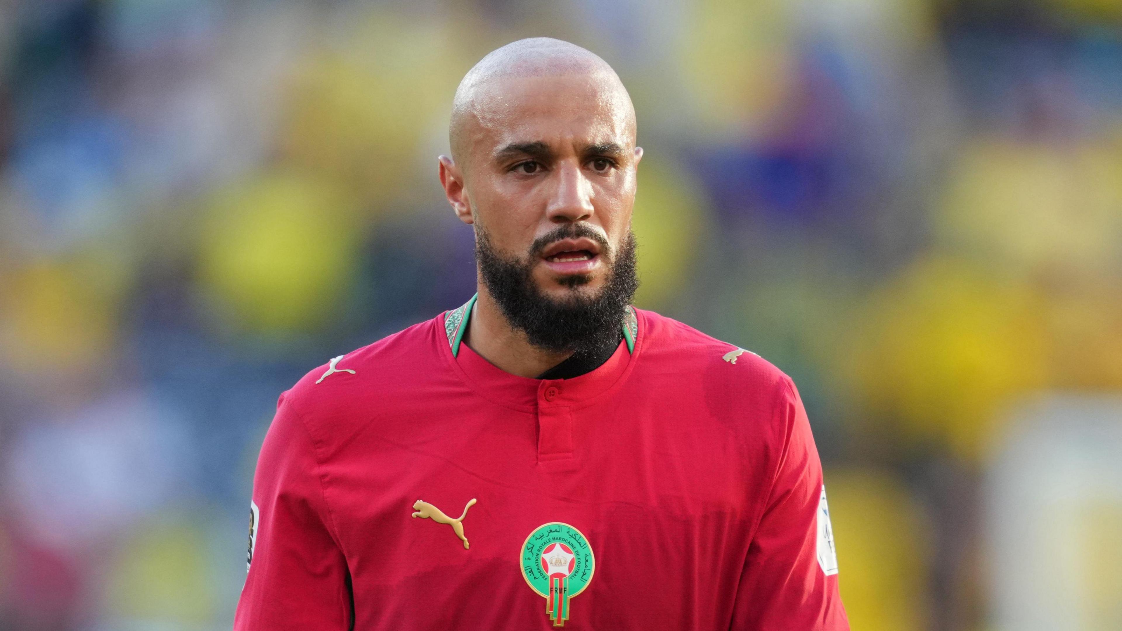 Noussair Mazraoui looks on during a Morocco game