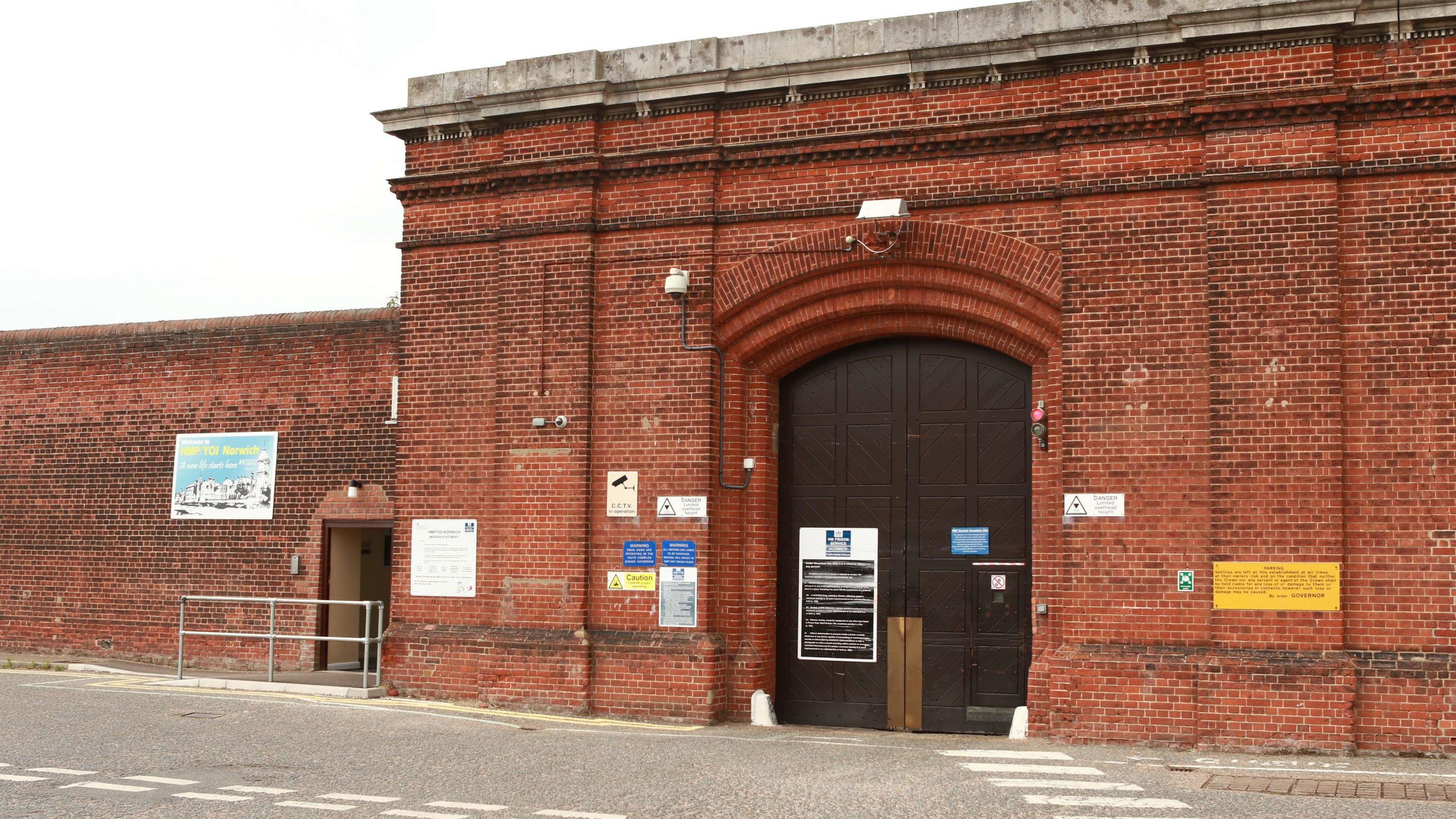 The red brick front of HMP Norwich