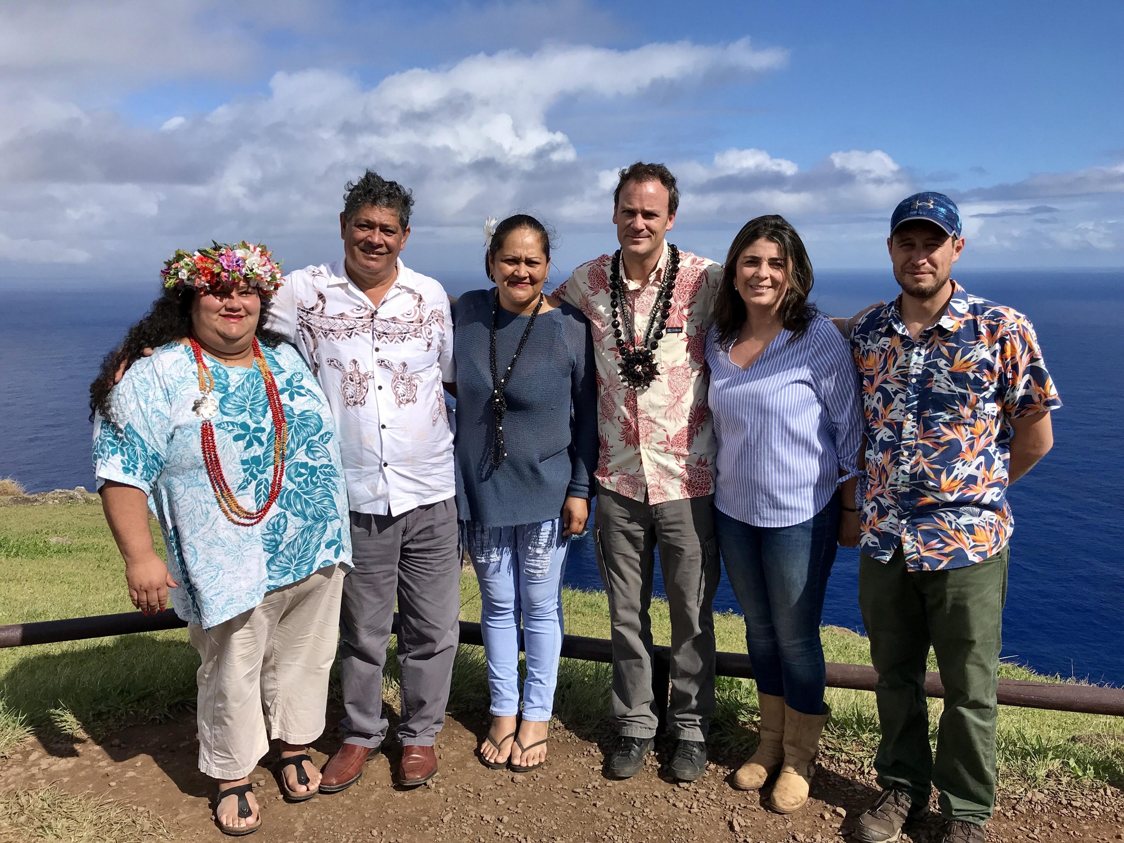 Anakena Manutomatoma (first from left) and Felipe Ward (third from right) pose for a photo on Rapa Nui