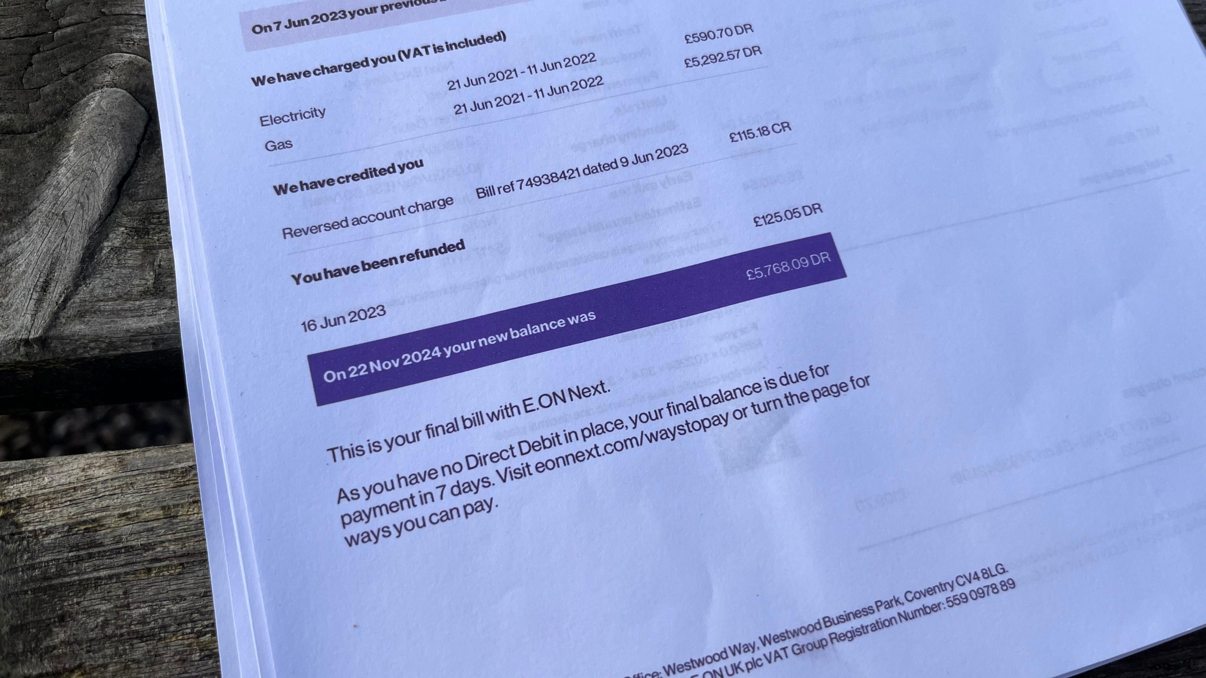 A photo of the bottom page of a paper bill showing the amount of £5,768.09 owed