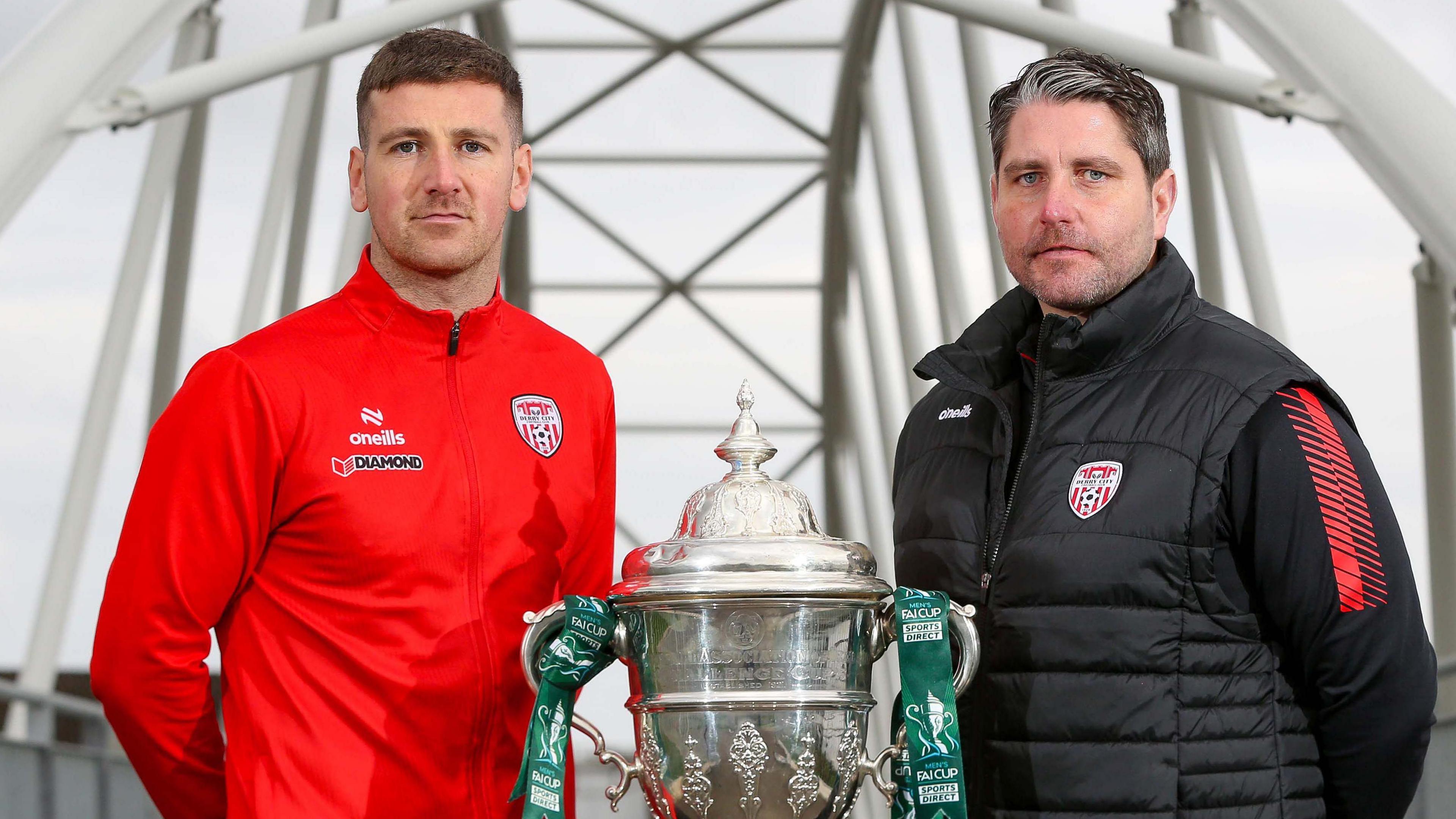 Derry City player Patrick McEleney and manager Ruaidhri Higgins pictured with the FAI Cup