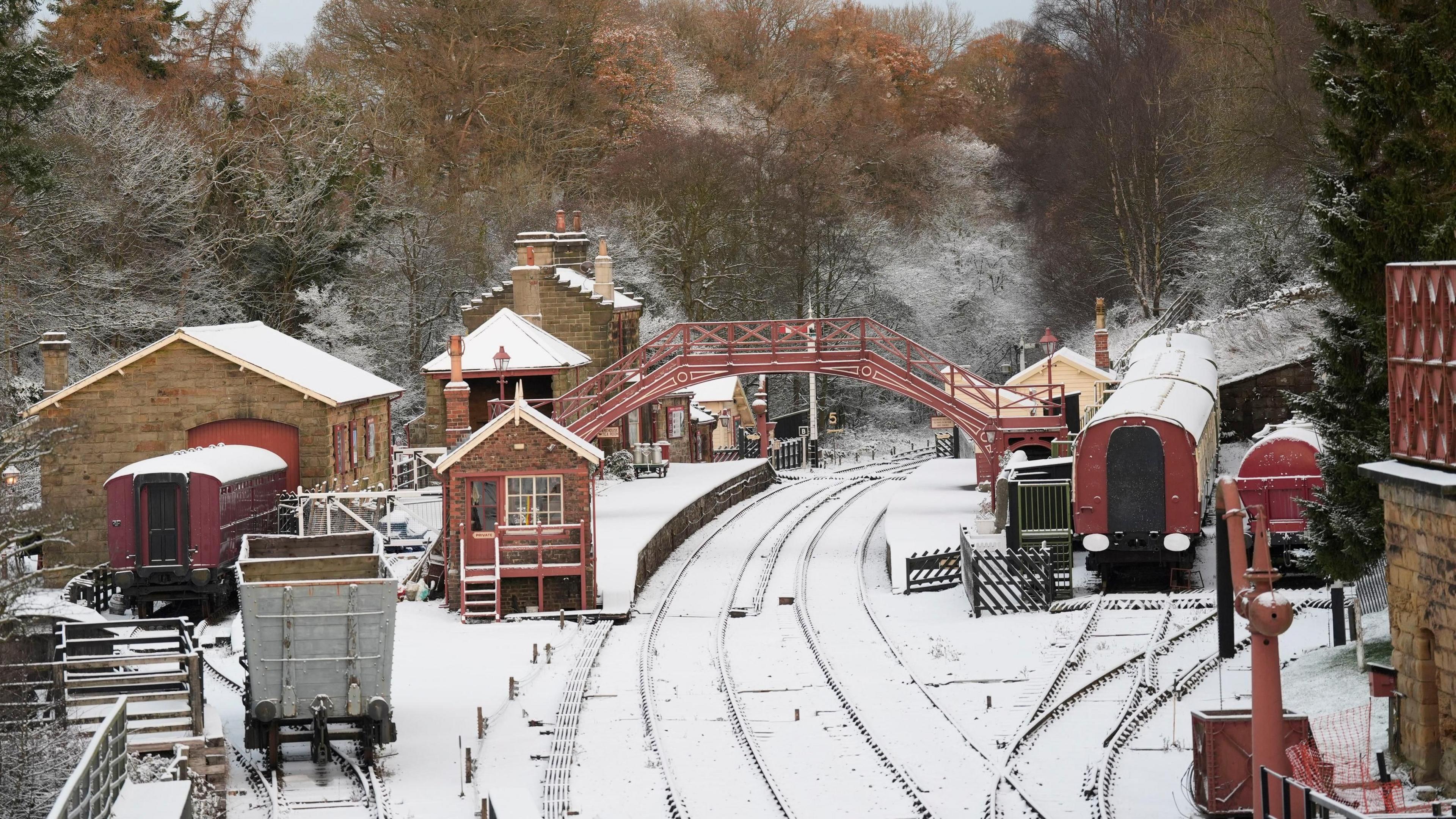 A railway station covered in snow.