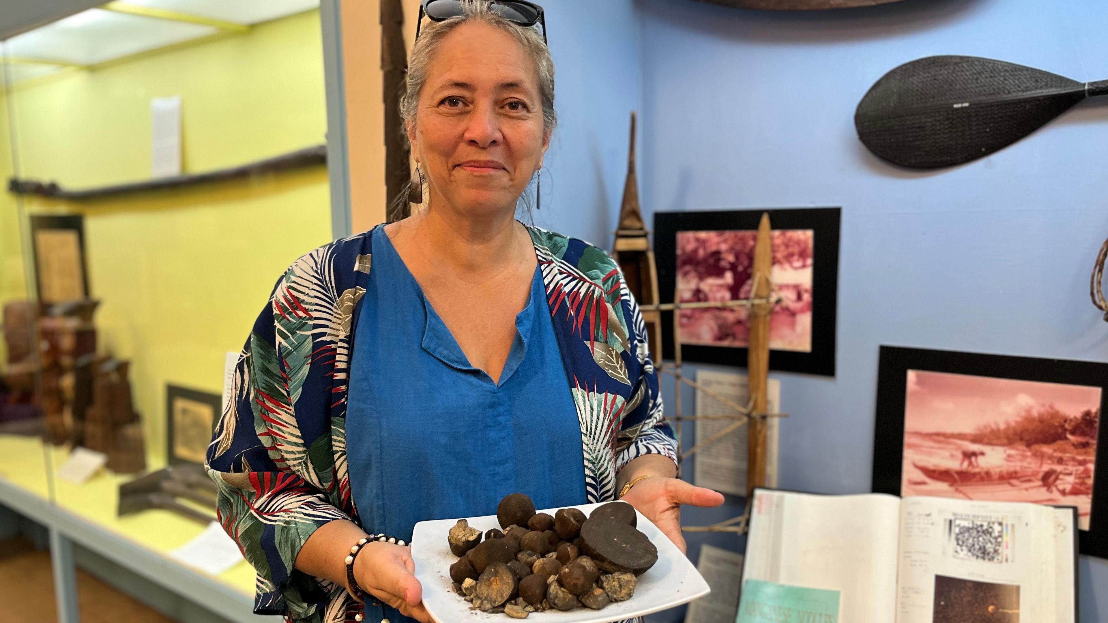 Jean Mason showing the polymetallic nodules in her museum