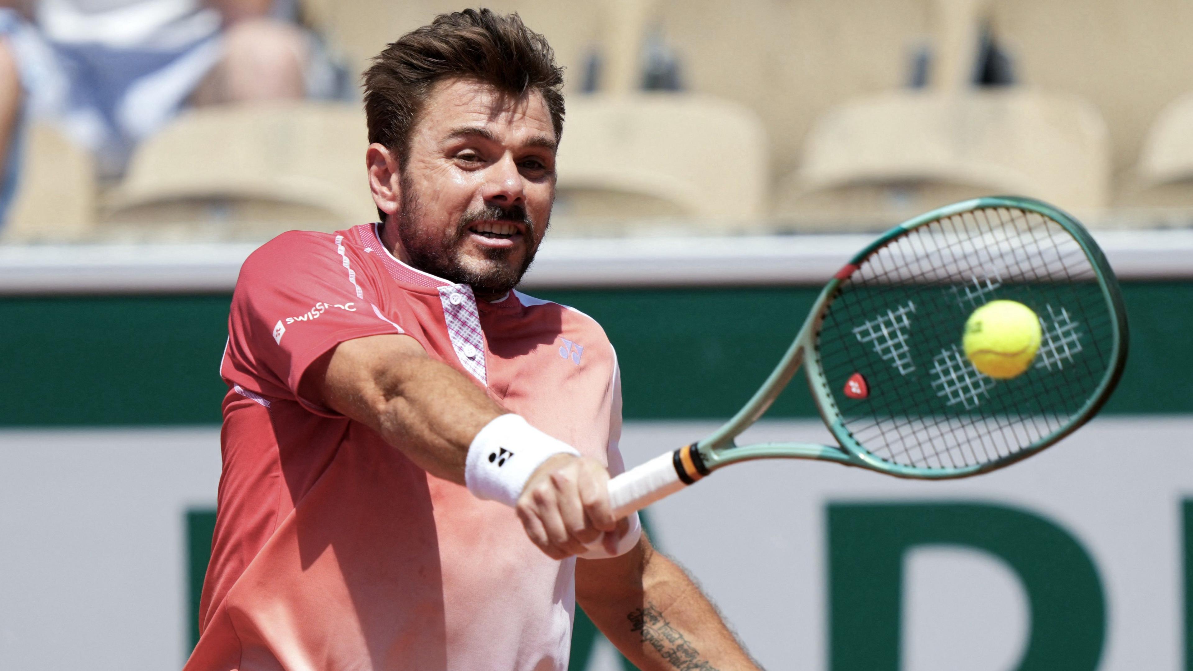 Stan Wawrinka hits a one-handed backhand