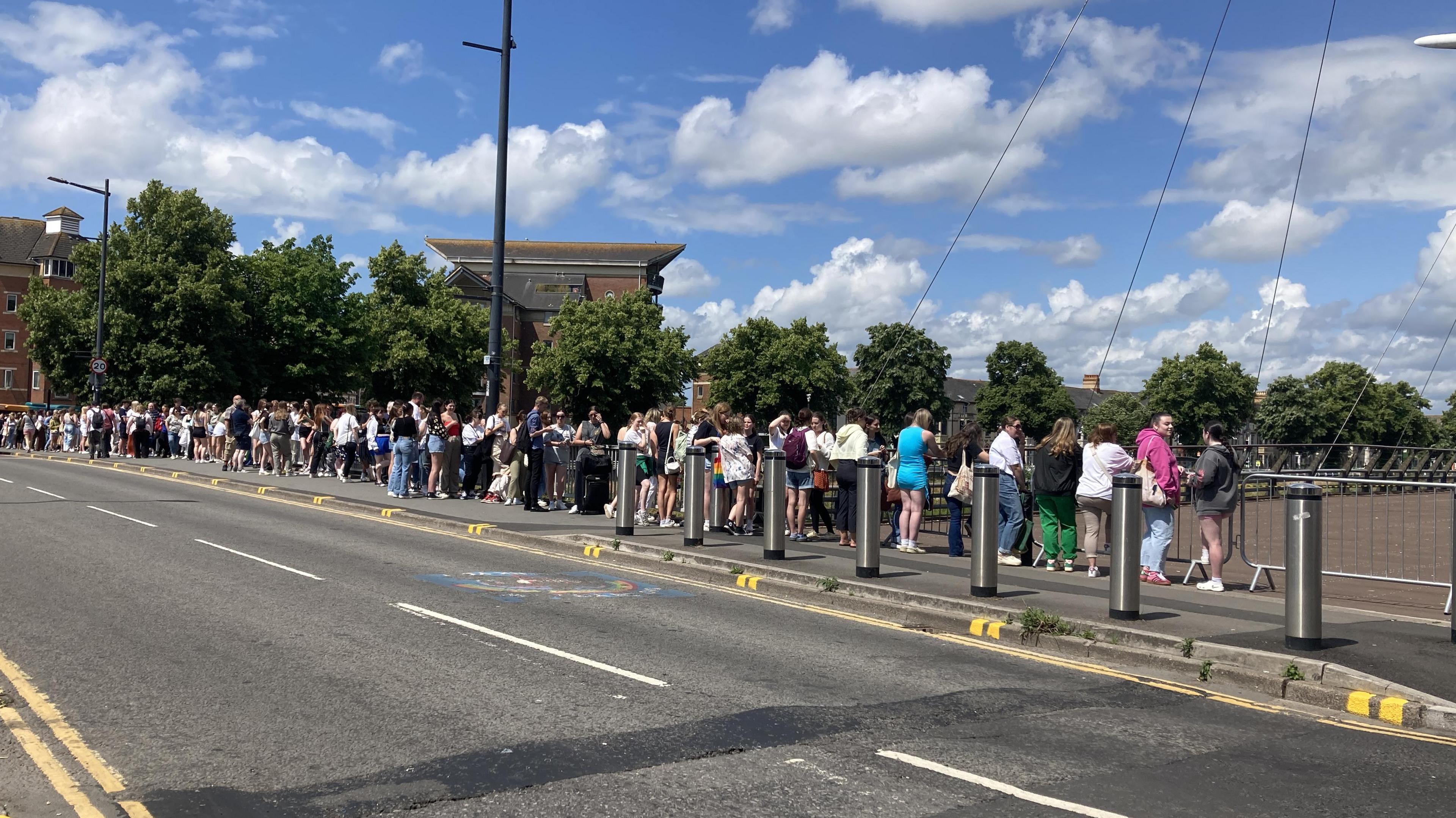 fans queuing for merchandise 