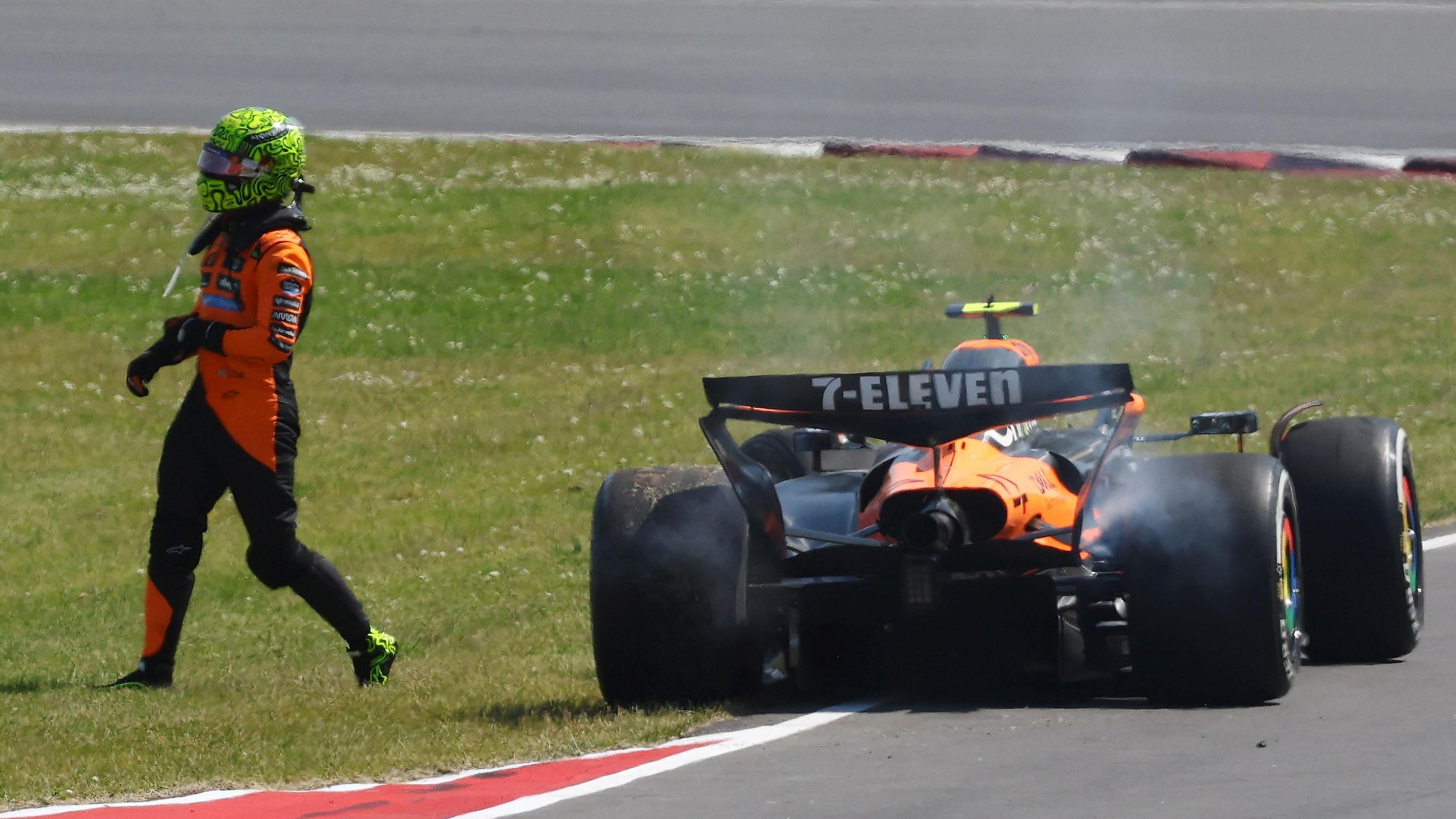 McLaren's Lando Norris walks away from his McLaren after colliding with Oscar Piastri during the Canadian Grand Prix