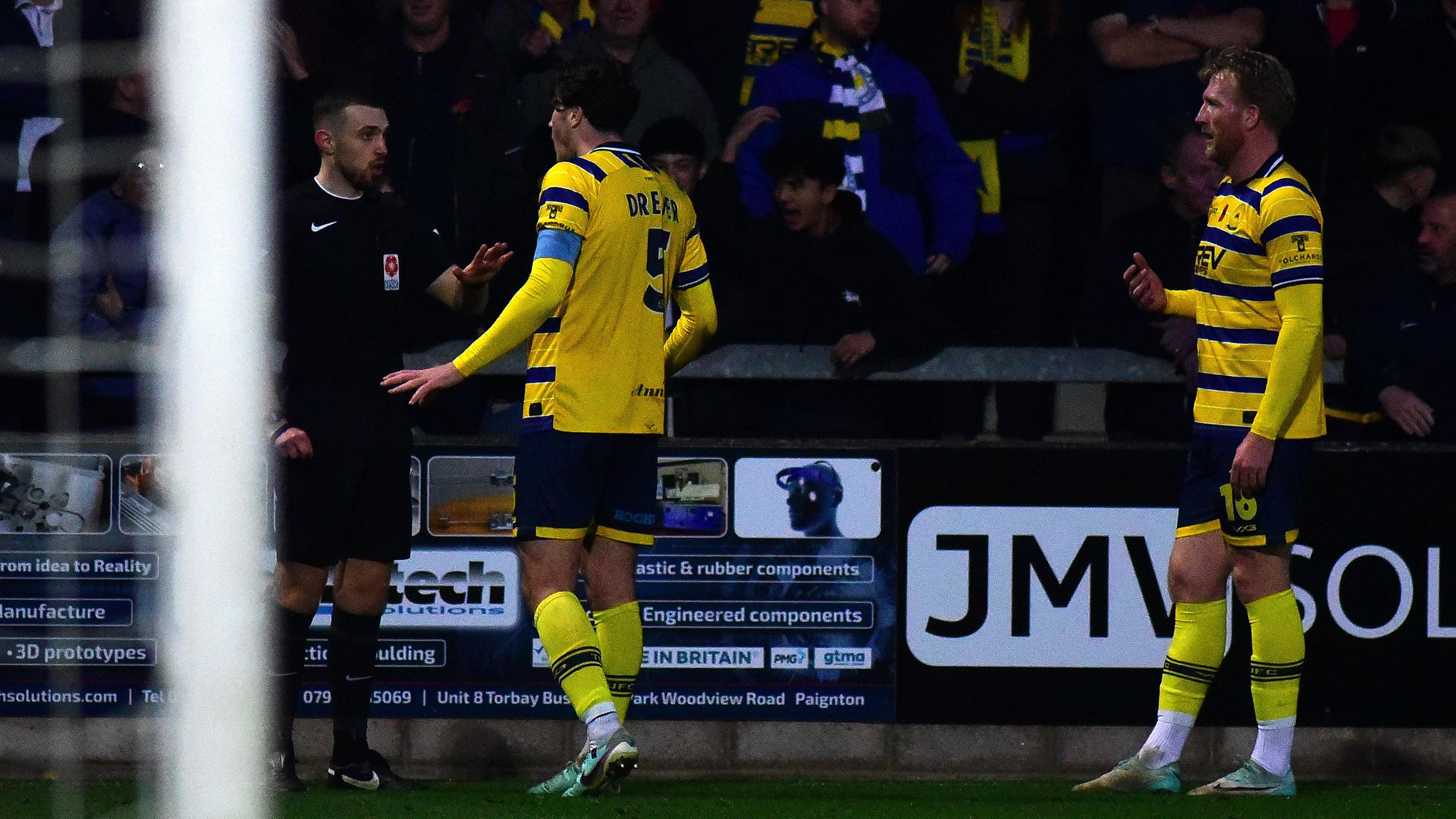 Torquay players appeal to the referee