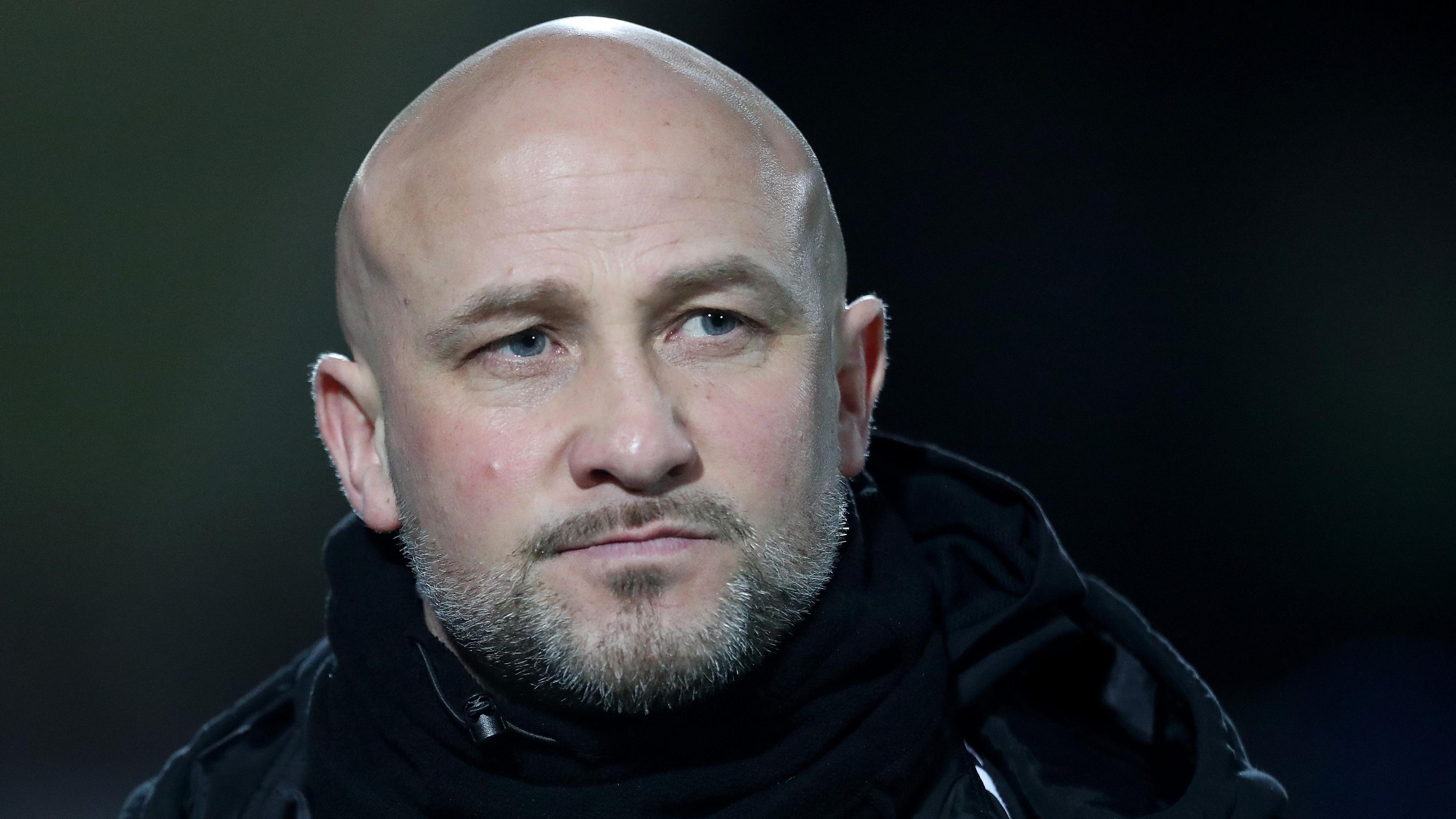 Phil Parkinson looks on during his time in charge of Altrincham