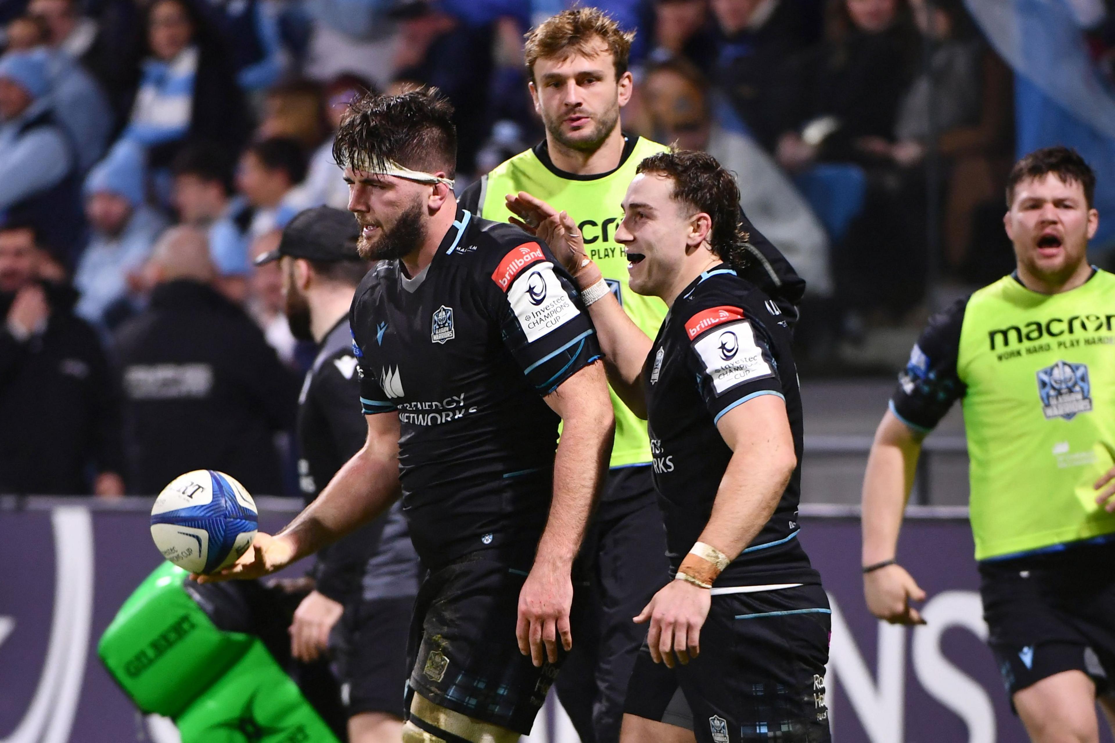 Ally Miller celebrates his first Glasgow try