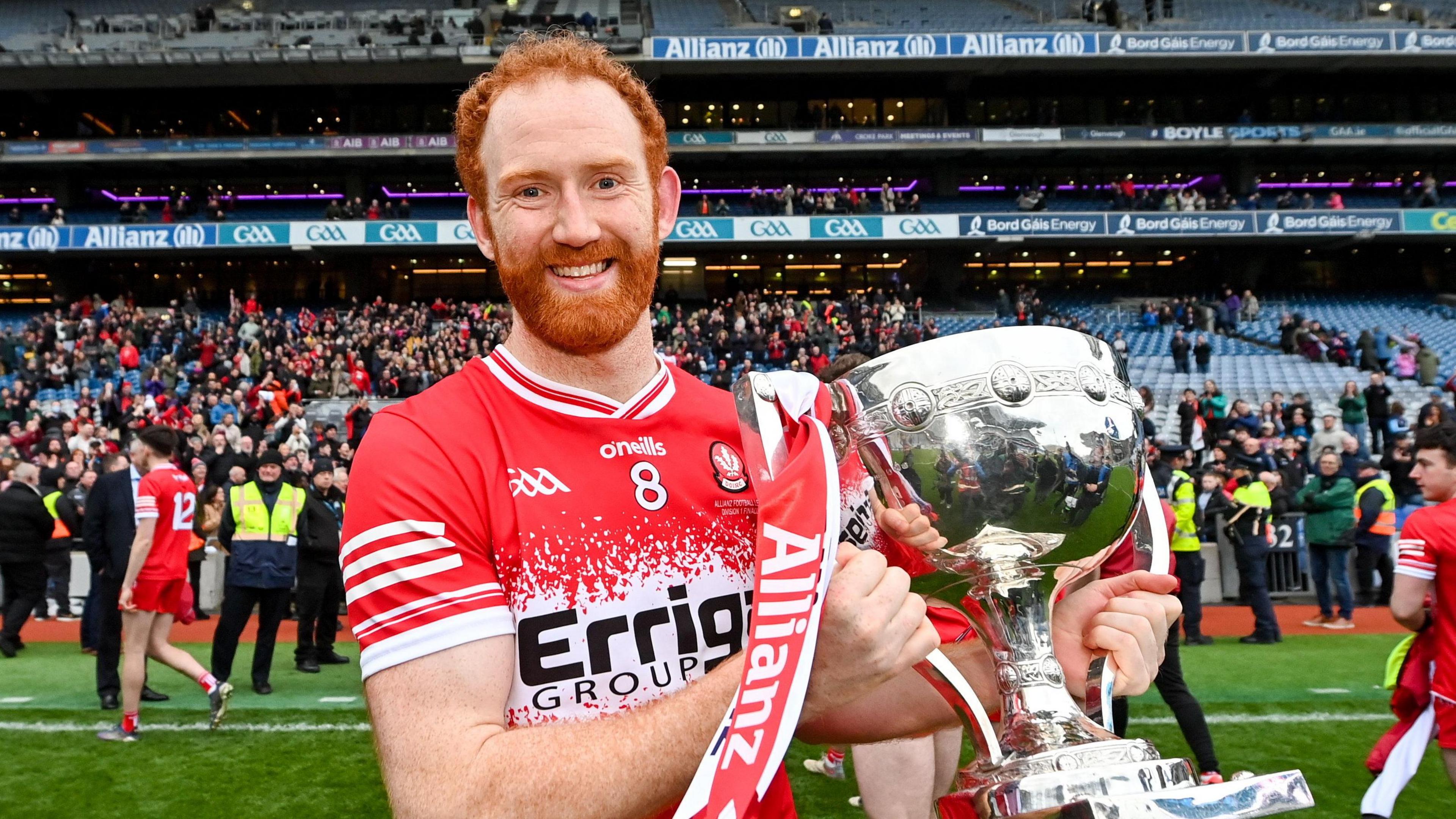 Derry captain Conor Glass with the National League trophy