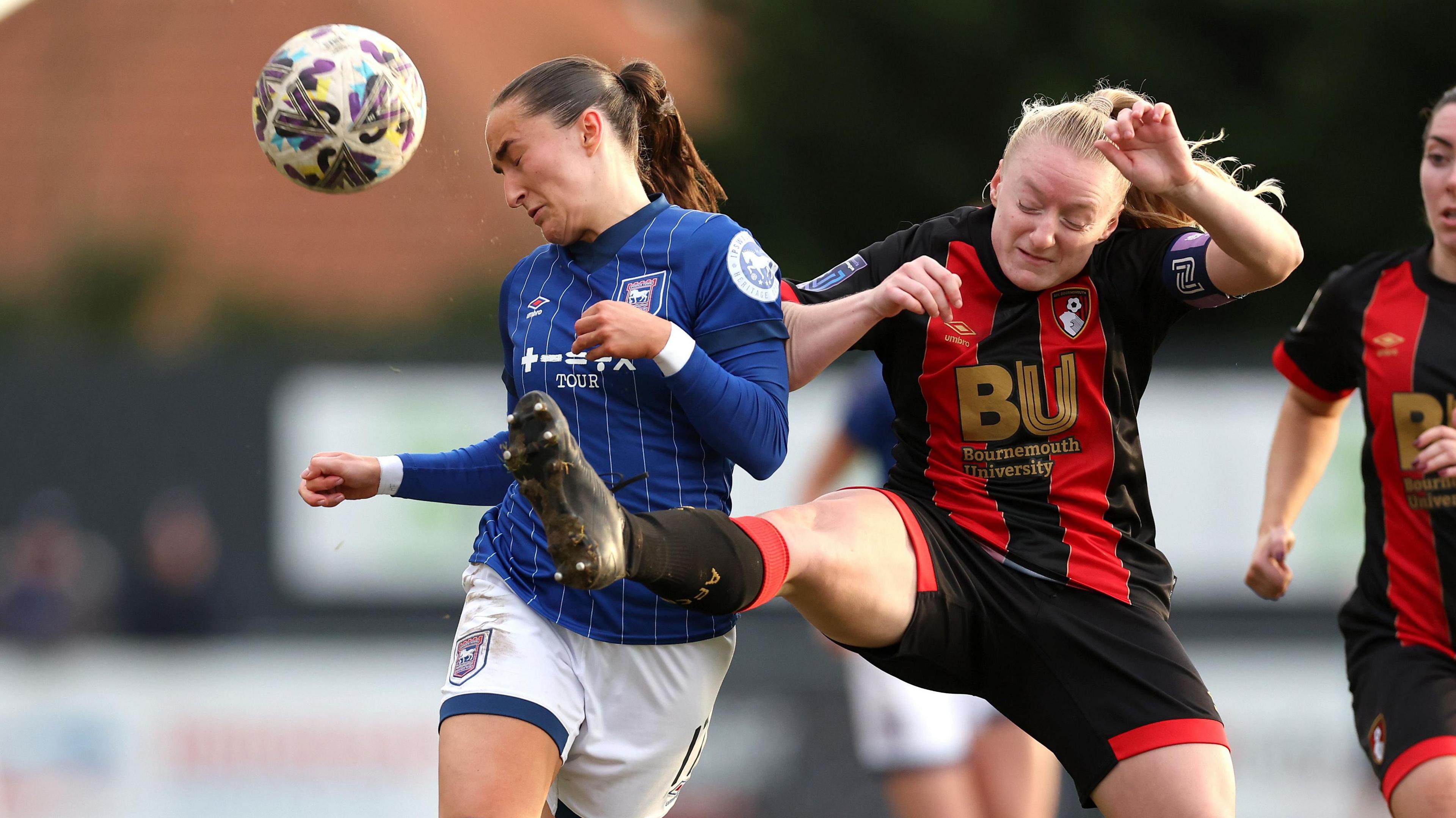 Ipswich Town player Sophie Peskett attempts a header