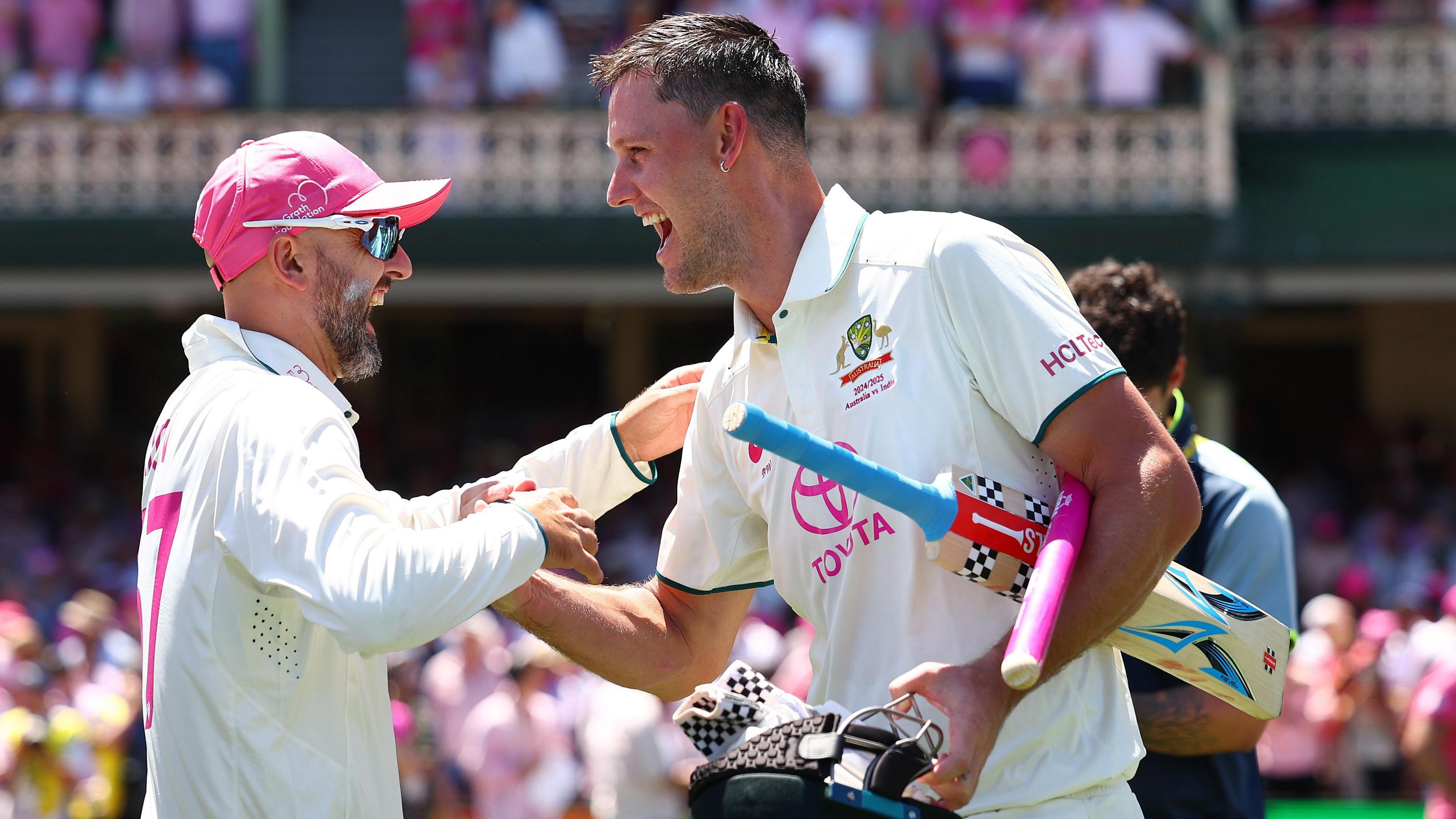 Nathan Lyon congratulates Beau Webster