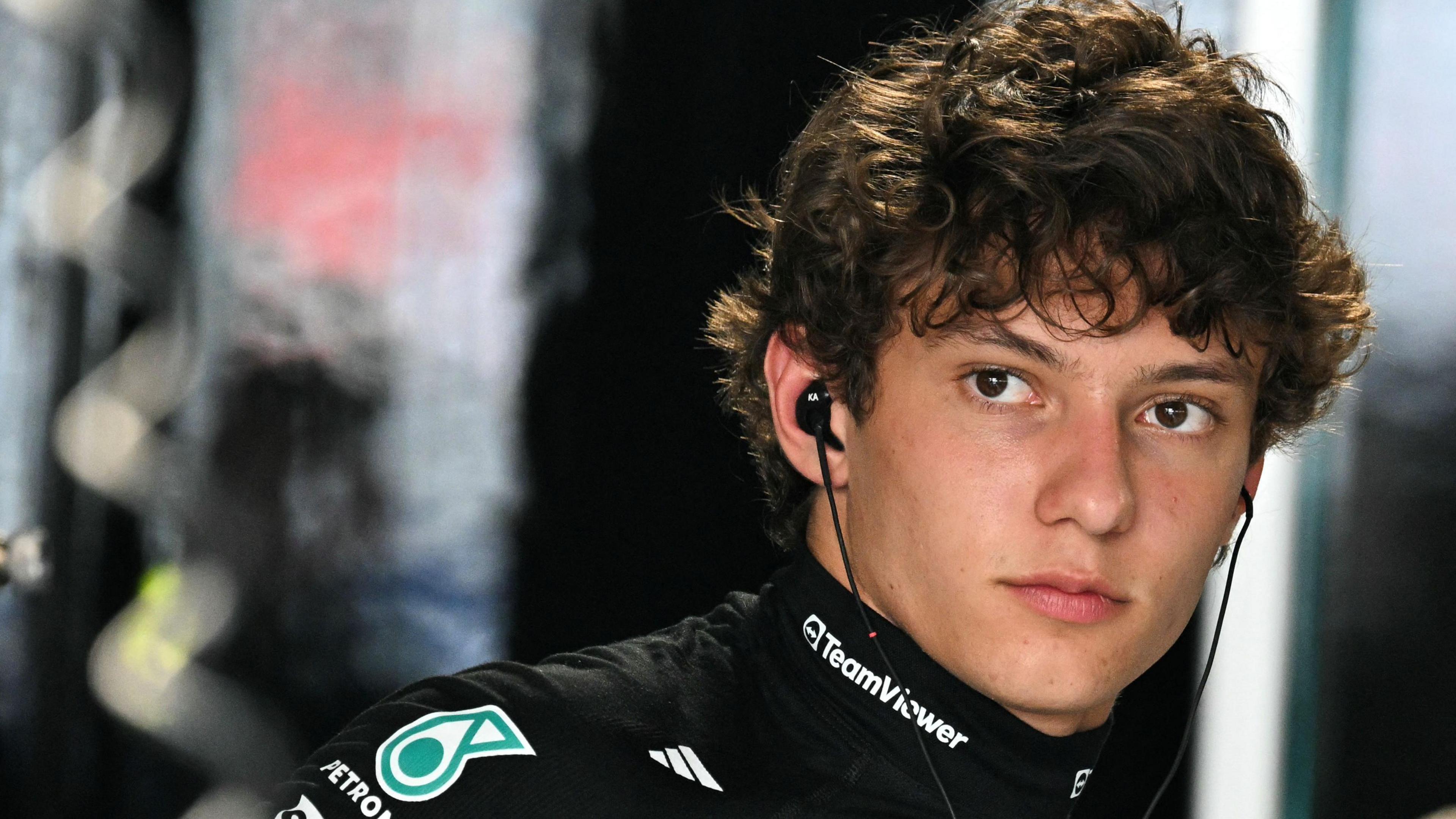 Kimi Antonelli wearing the Mercedes race uniform and wearing ear defenders at the Miami Grand Prix