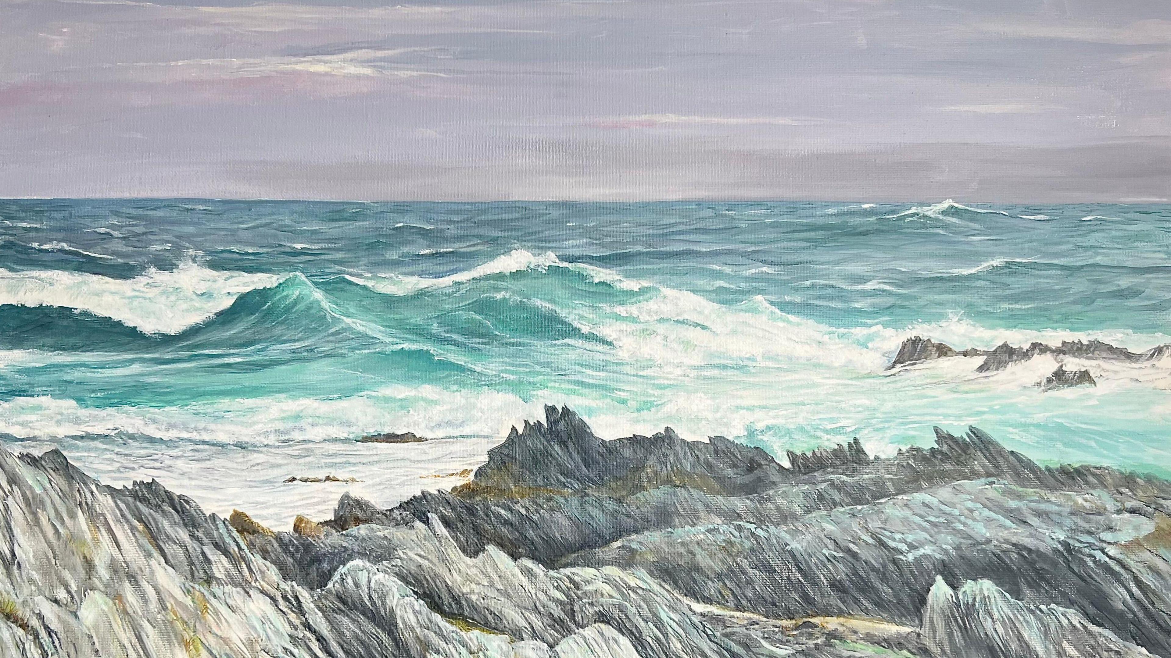 A painting of rough seas, there are jagged grey rocks on the shoreline.